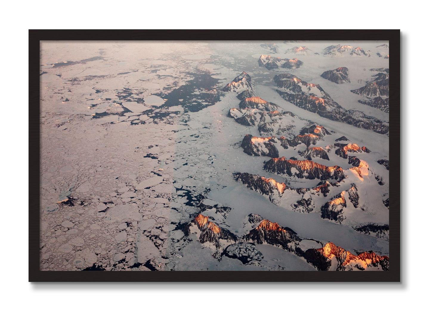 Framed photograph of Greenland Peaks by Dylan Ozanich, Black Walnut frame, Full Bleed