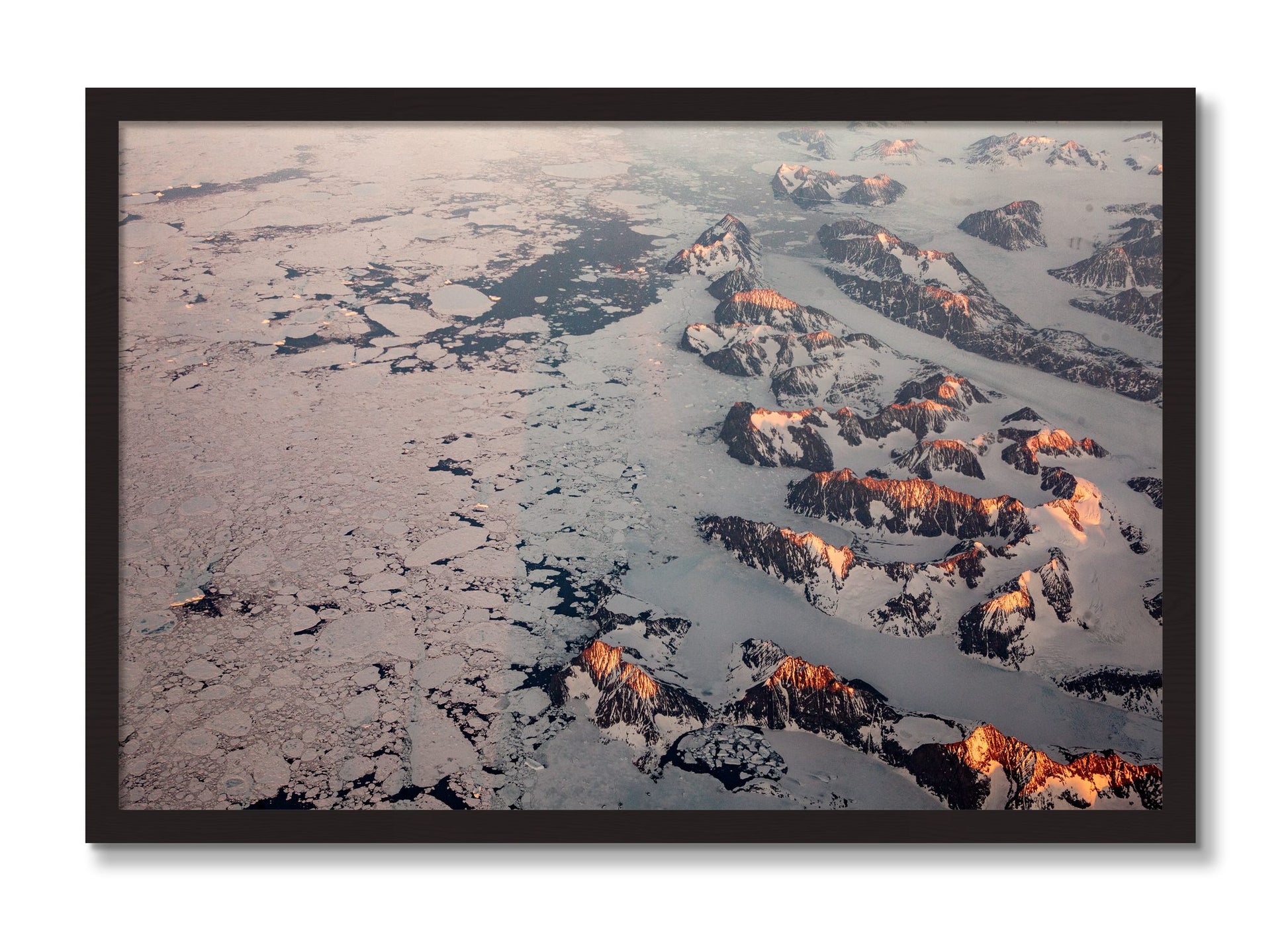 Framed photograph of Greenland Peaks by Dylan Ozanich, Black Walnut frame, Full Bleed