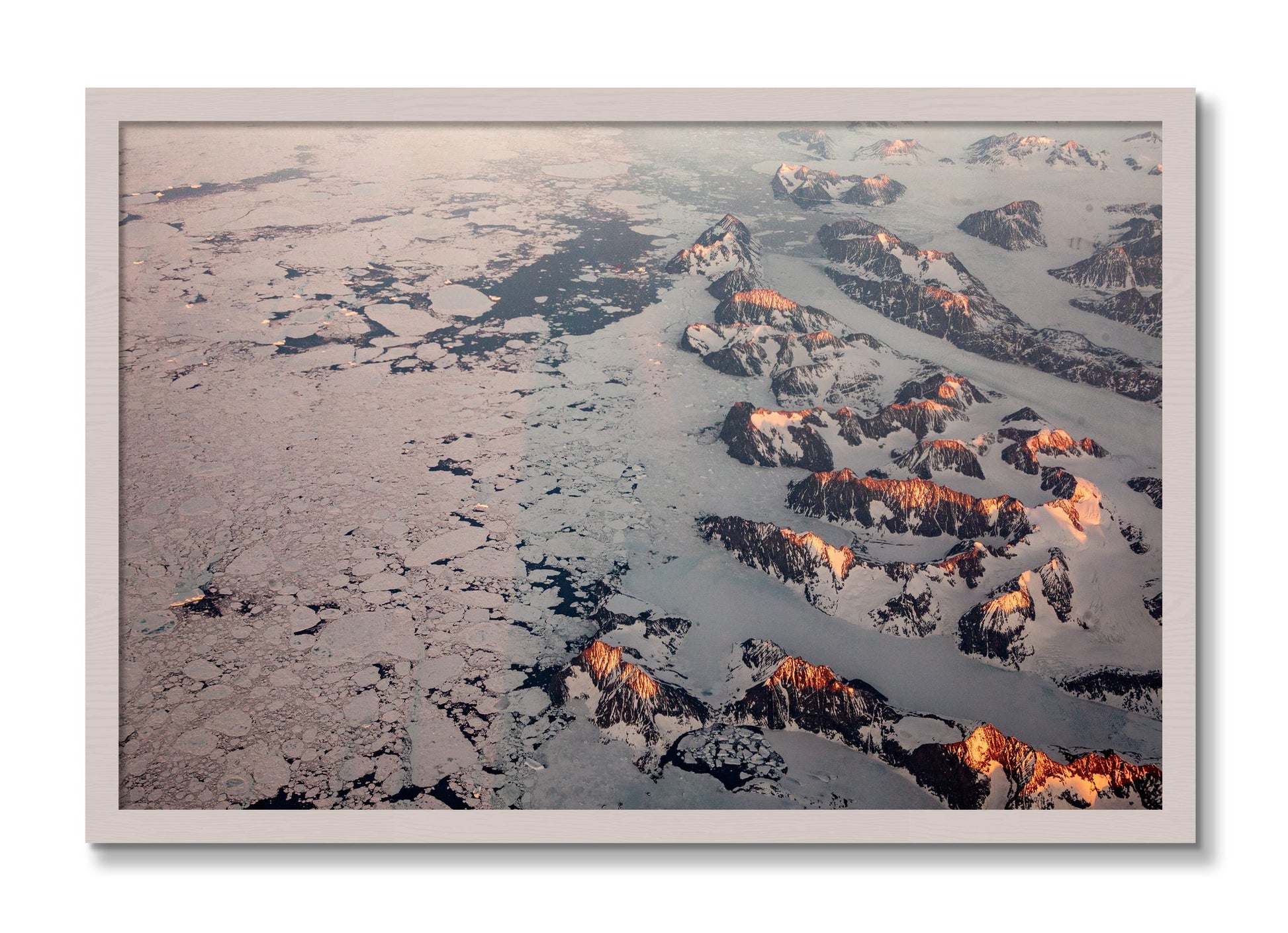 Framed photograph of Greenland Peaks by Dylan Ozanich, White Maple frame, Full Bleed