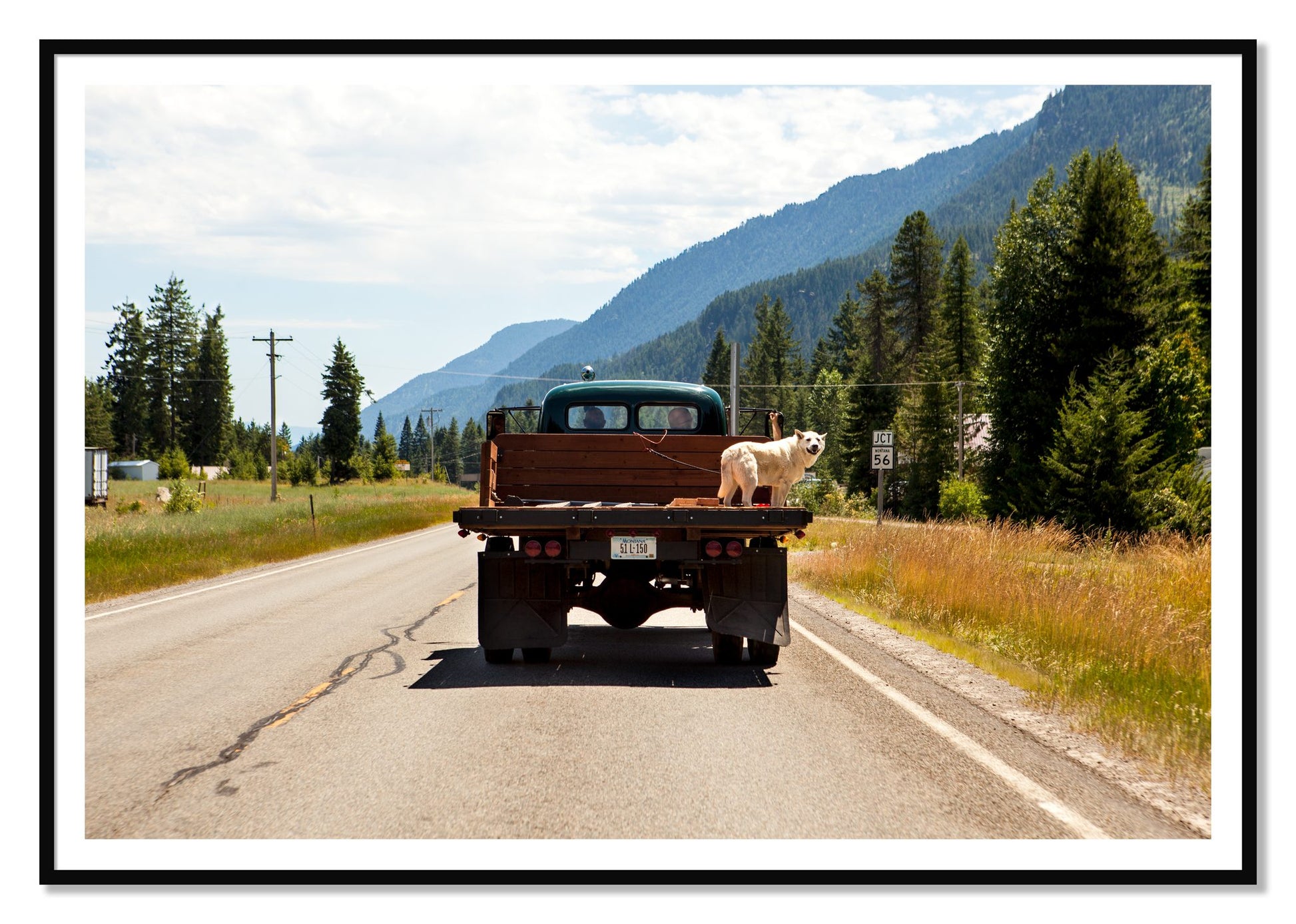 Heading To Town by Dylan Ozanich, 48×72 print with a White Border in a Black frame