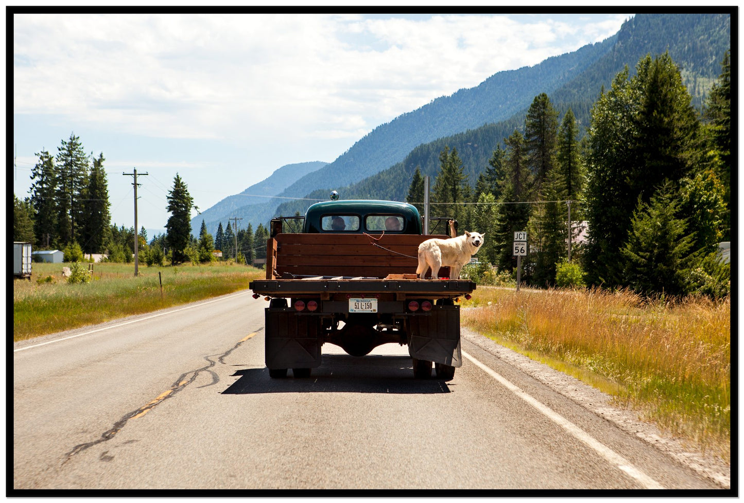 Heading To Town by Dylan Ozanich, 48×72 Full Bleed Print in a Black frame