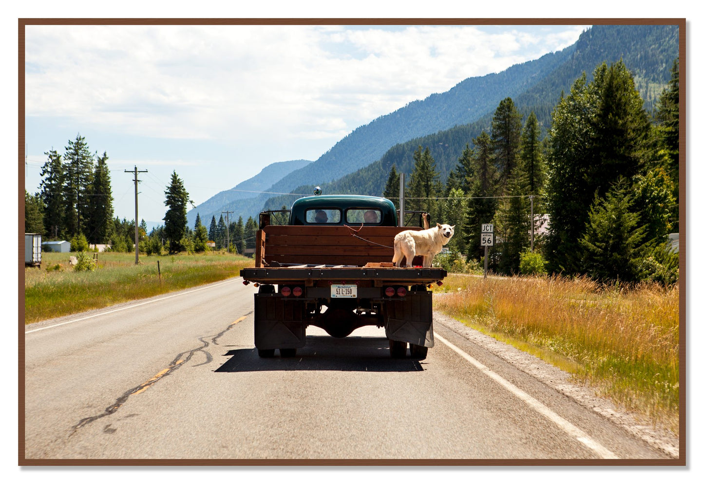 Heading To Town by Dylan Ozanich, 48×72 Full Bleed Print in a Walnut frame