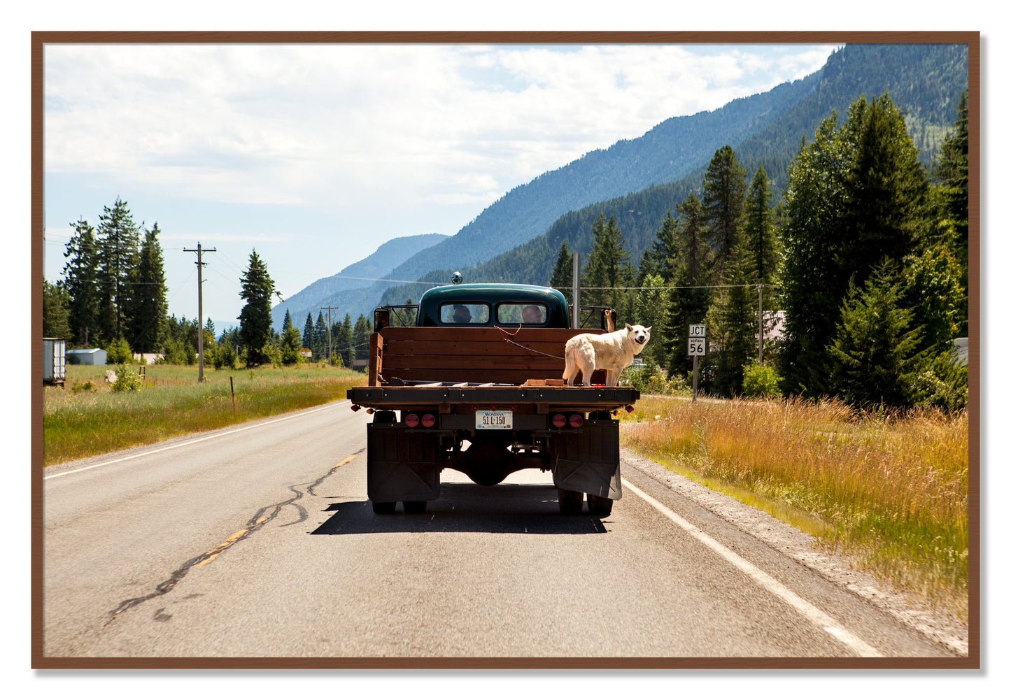 Framed photograph of Heading To Town by Dylan Ozanich, Walnut frame, Full Bleed