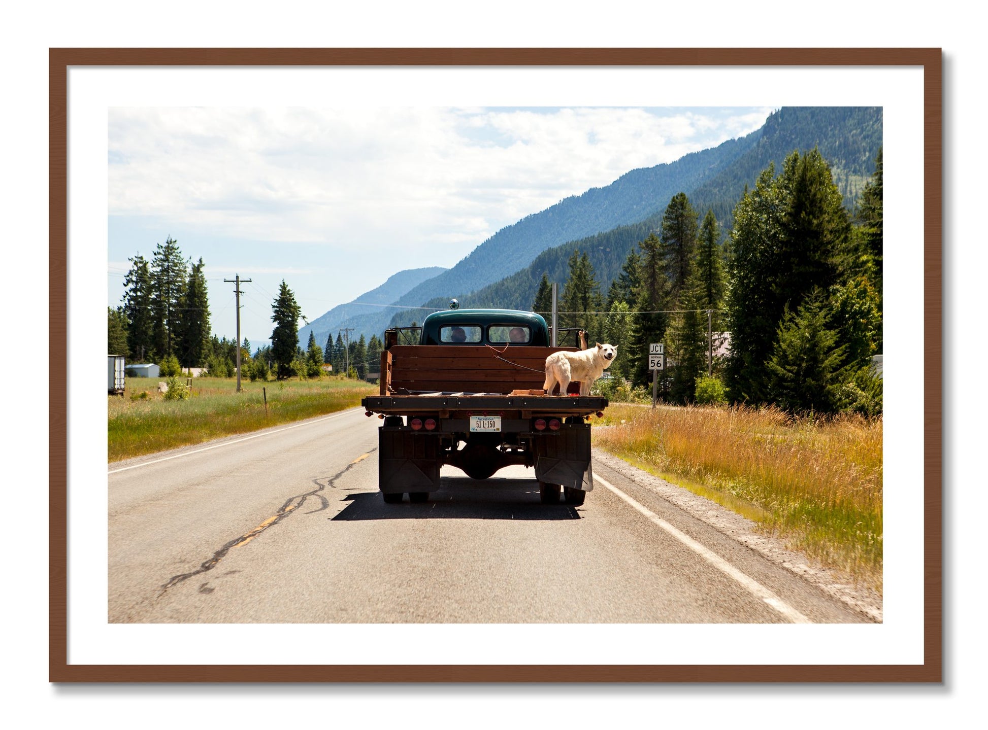 Framed photograph of Heading To Town by Dylan Ozanich, Walnut frame, Borders
