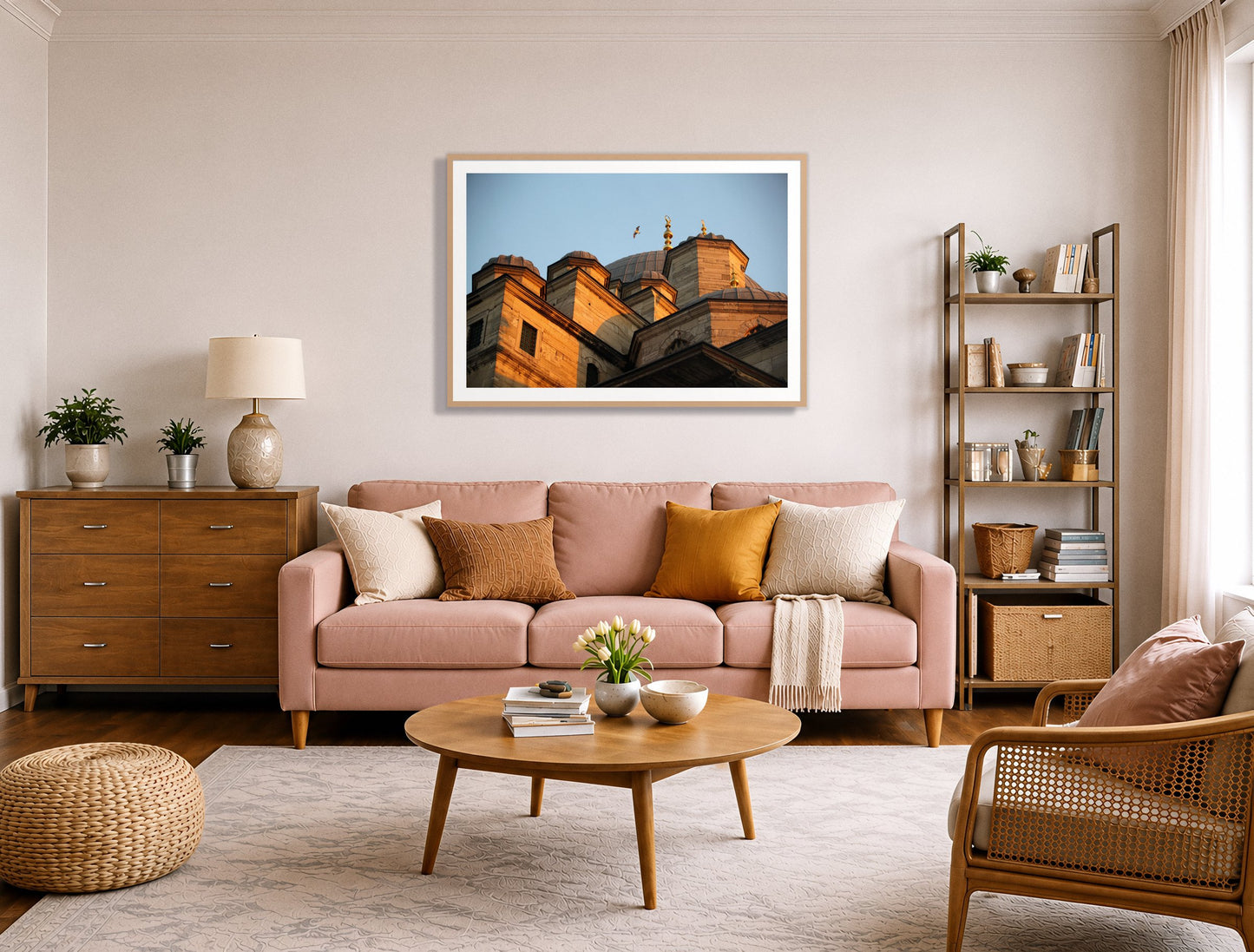Istanbul by Dylan Ozanich in an Oak frame, above a blush pink sofa in a warm, eclectic living room