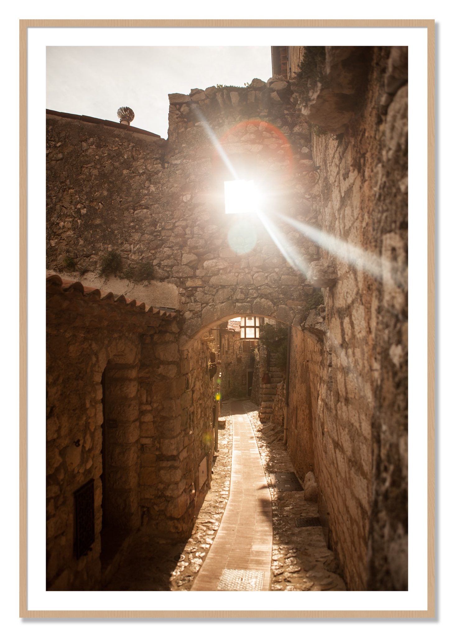 Framed photograph of Italian Light by Dylan Ozanich, Oak frame, Borders
