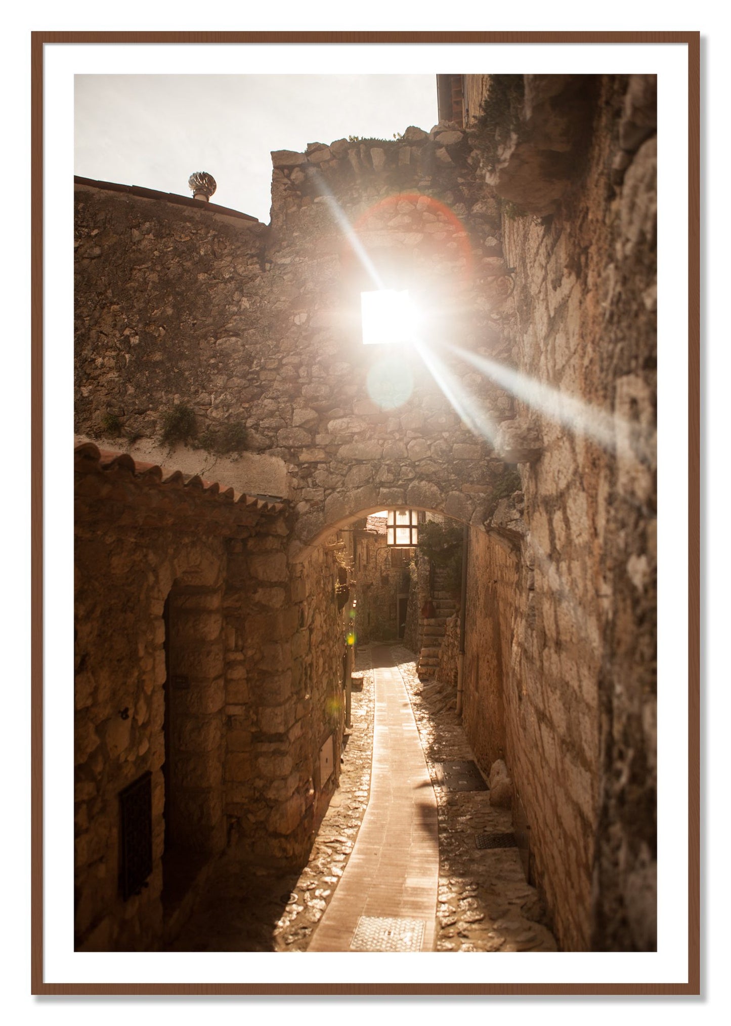 Framed photograph of Italian Light by Dylan Ozanich, Walnut frame, Borders