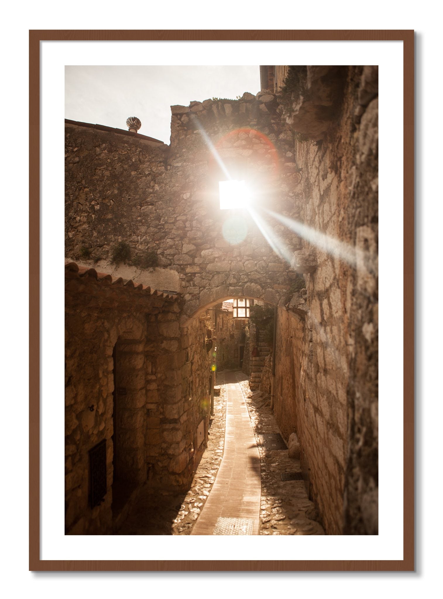Framed photograph of Italian Light by Dylan Ozanich, Walnut frame, Borders