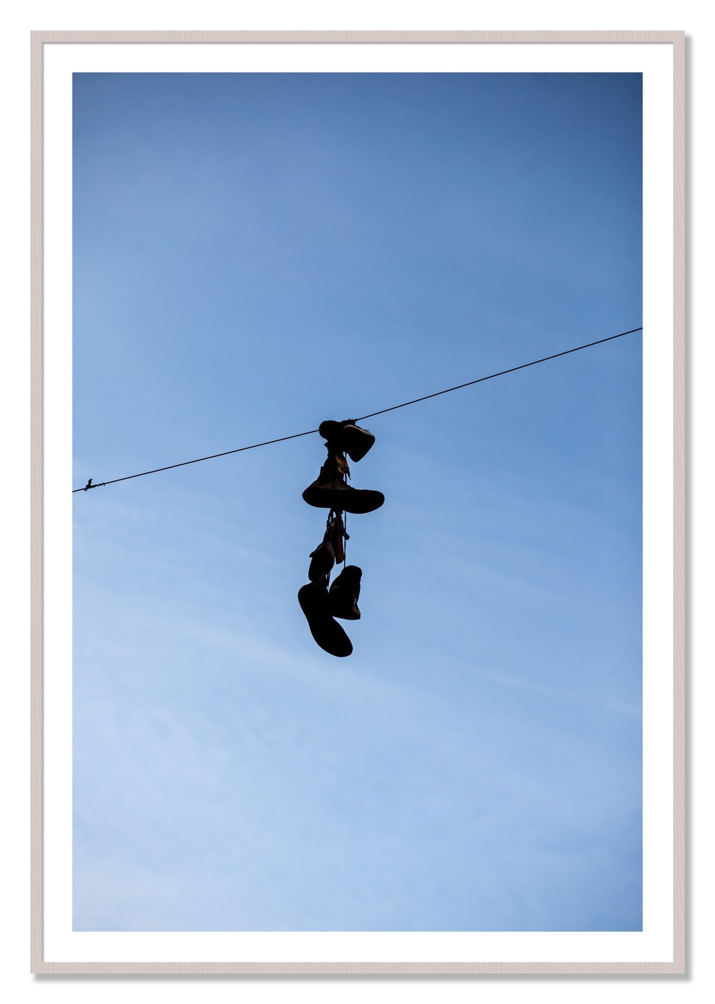 Framed photograph of Kicks by Dylan Ozanich, White Maple frame, Borders