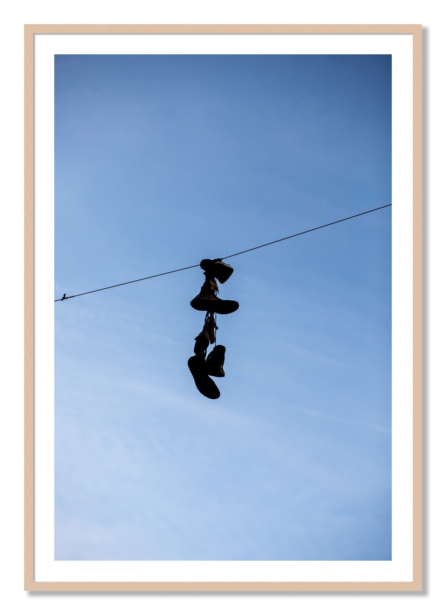Framed photograph of Kicks by Dylan Ozanich, Maple frame, Borders