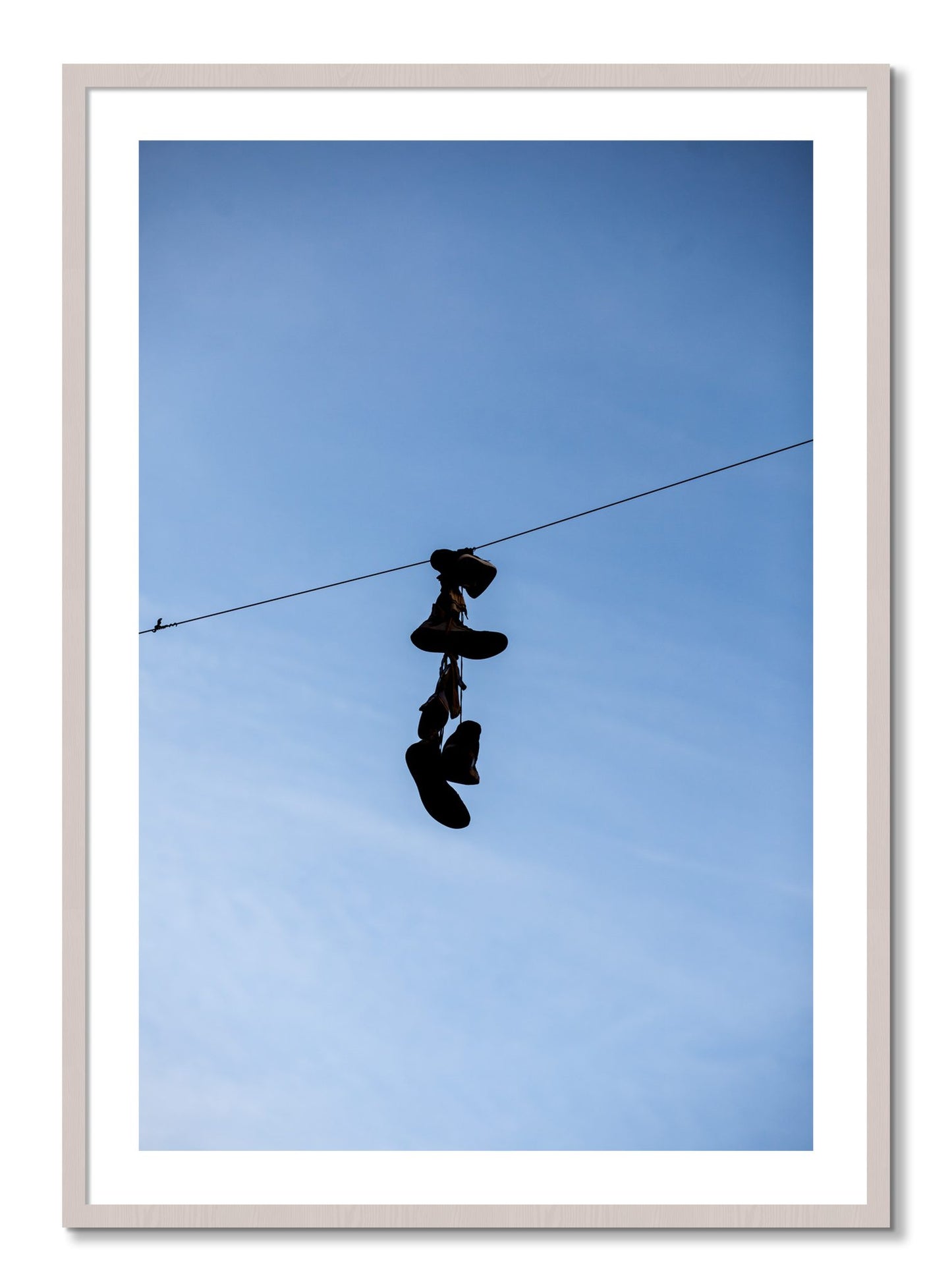 Framed photograph of Kicks by Dylan Ozanich, White Maple frame, Borders