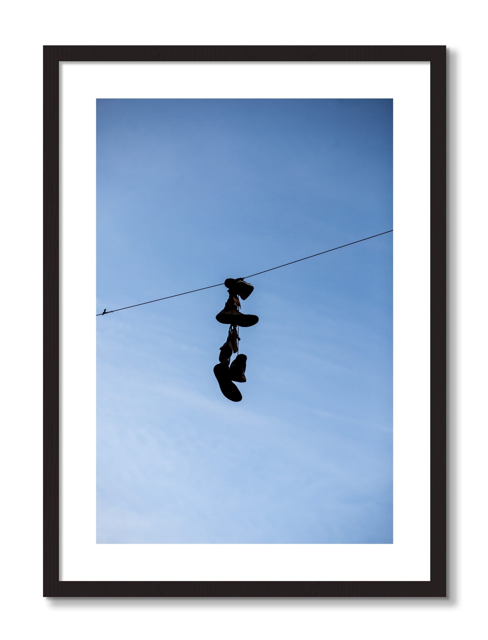 Framed photograph of Kicks by Dylan Ozanich, Black frame, Borders