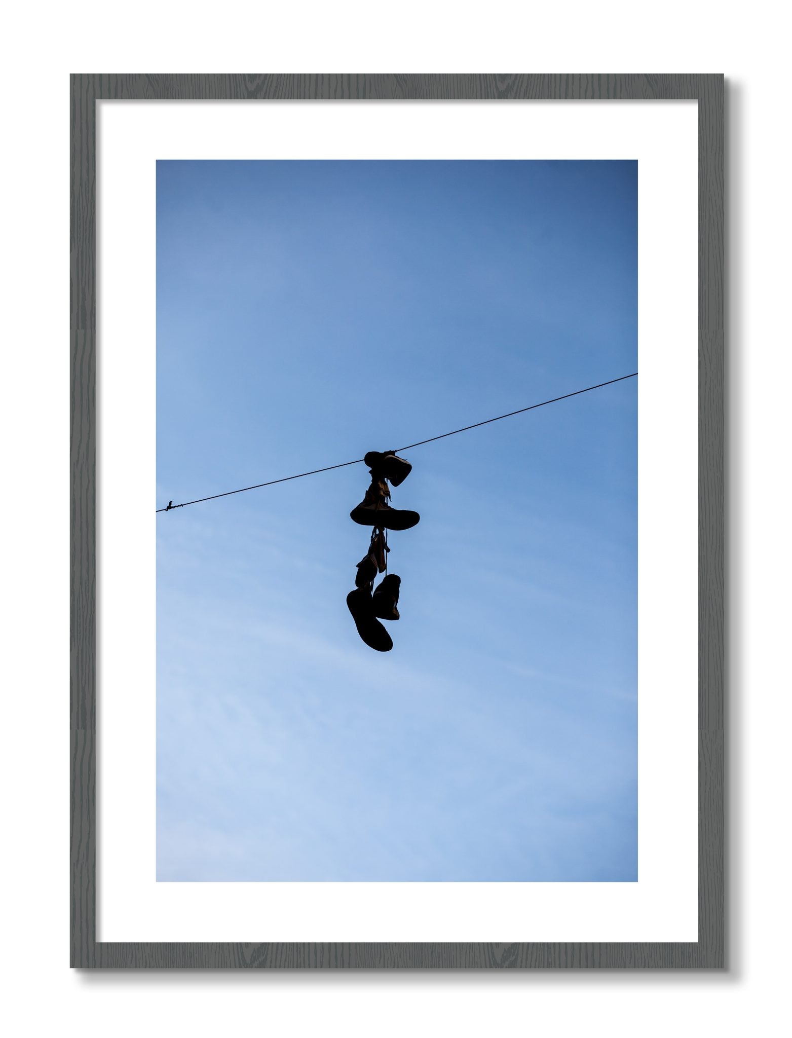 Framed photograph of Kicks by Dylan Ozanich, Grey frame, Borders