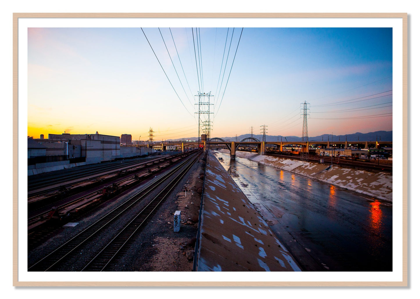 LARiver by Dylan Ozanich, 48×72 print with a White Border in a Maple frame