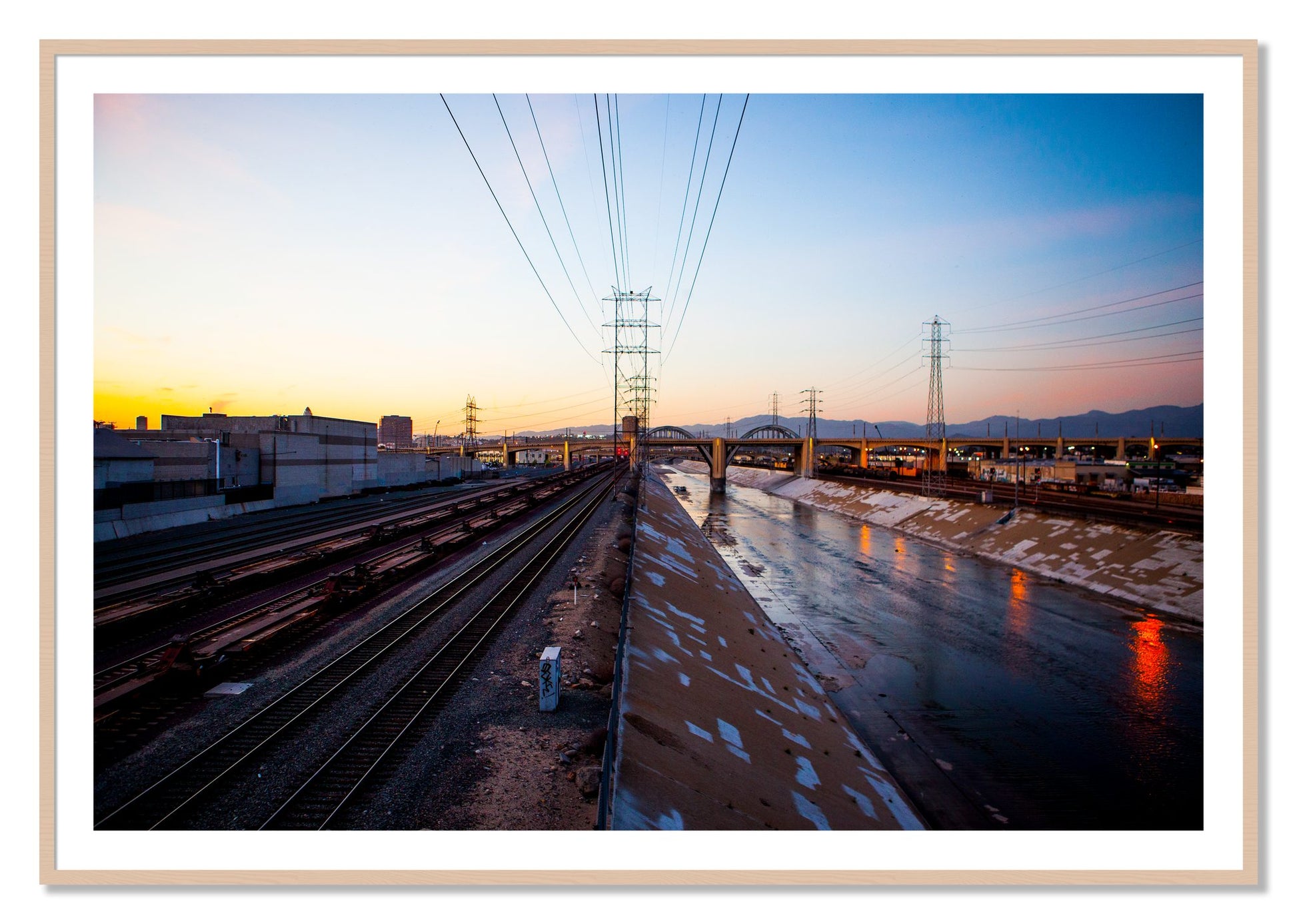 Framed photograph of LARiver by Dylan Ozanich, Maple frame, Borders