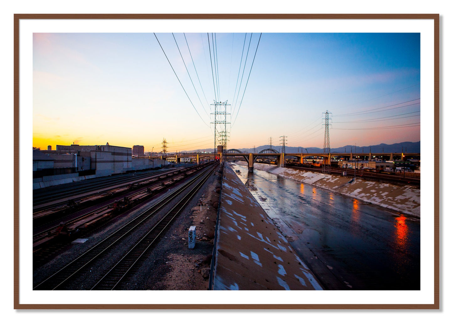 Framed photograph of LARiver by Dylan Ozanich, Walnut frame, Borders