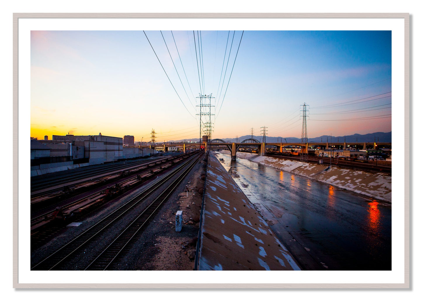 Framed photograph of LARiver by Dylan Ozanich, White Maple frame, Borders