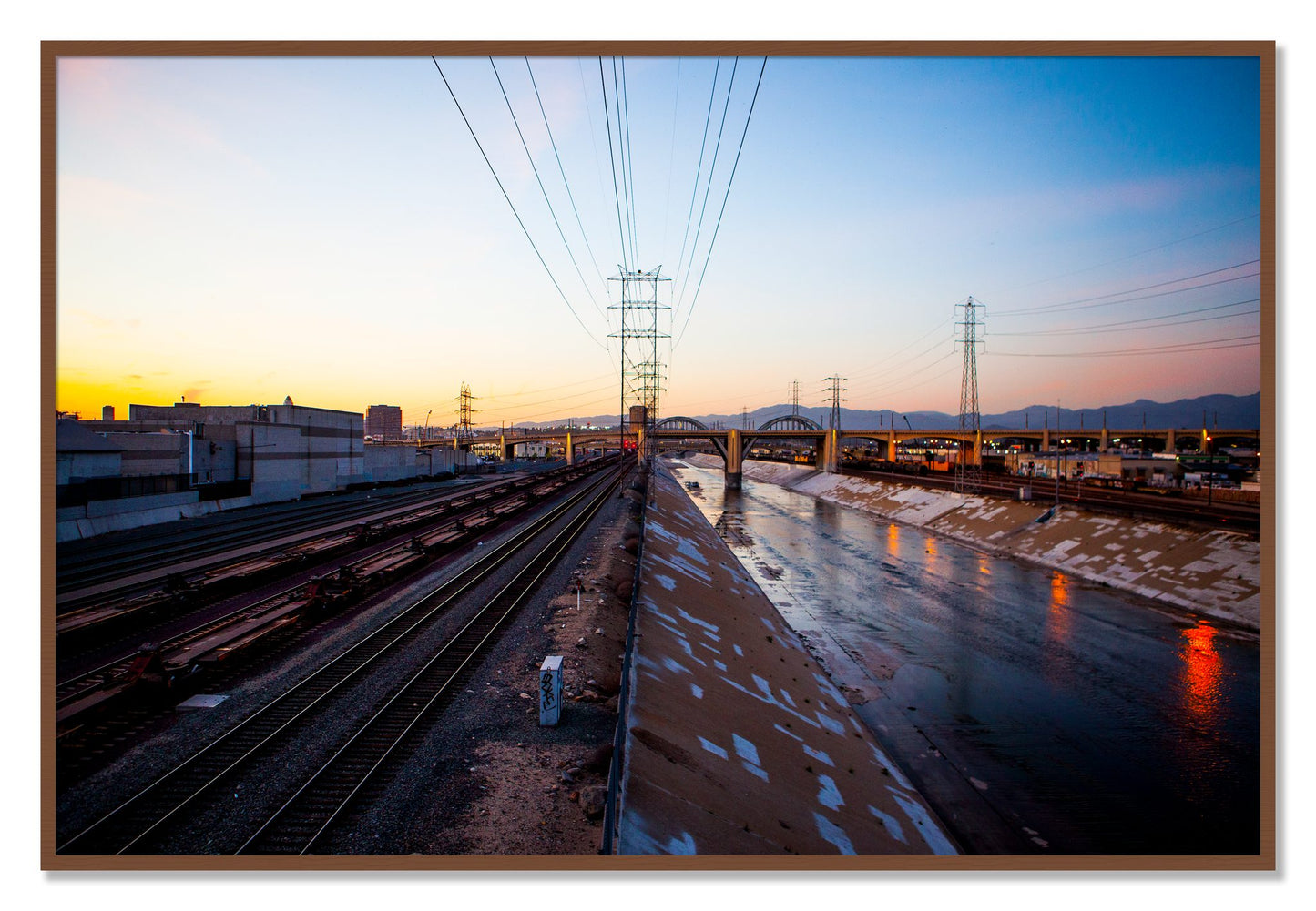Framed photograph of LARiver by Dylan Ozanich, Walnut frame, Full Bleed