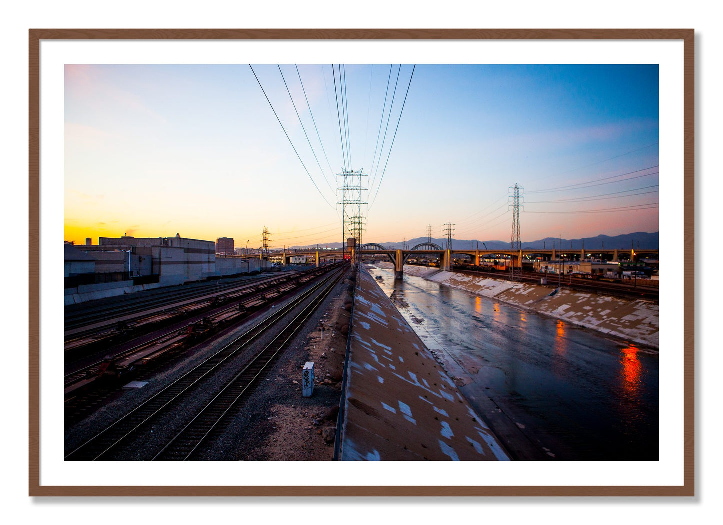 Framed photograph of LARiver by Dylan Ozanich, Walnut frame, Borders