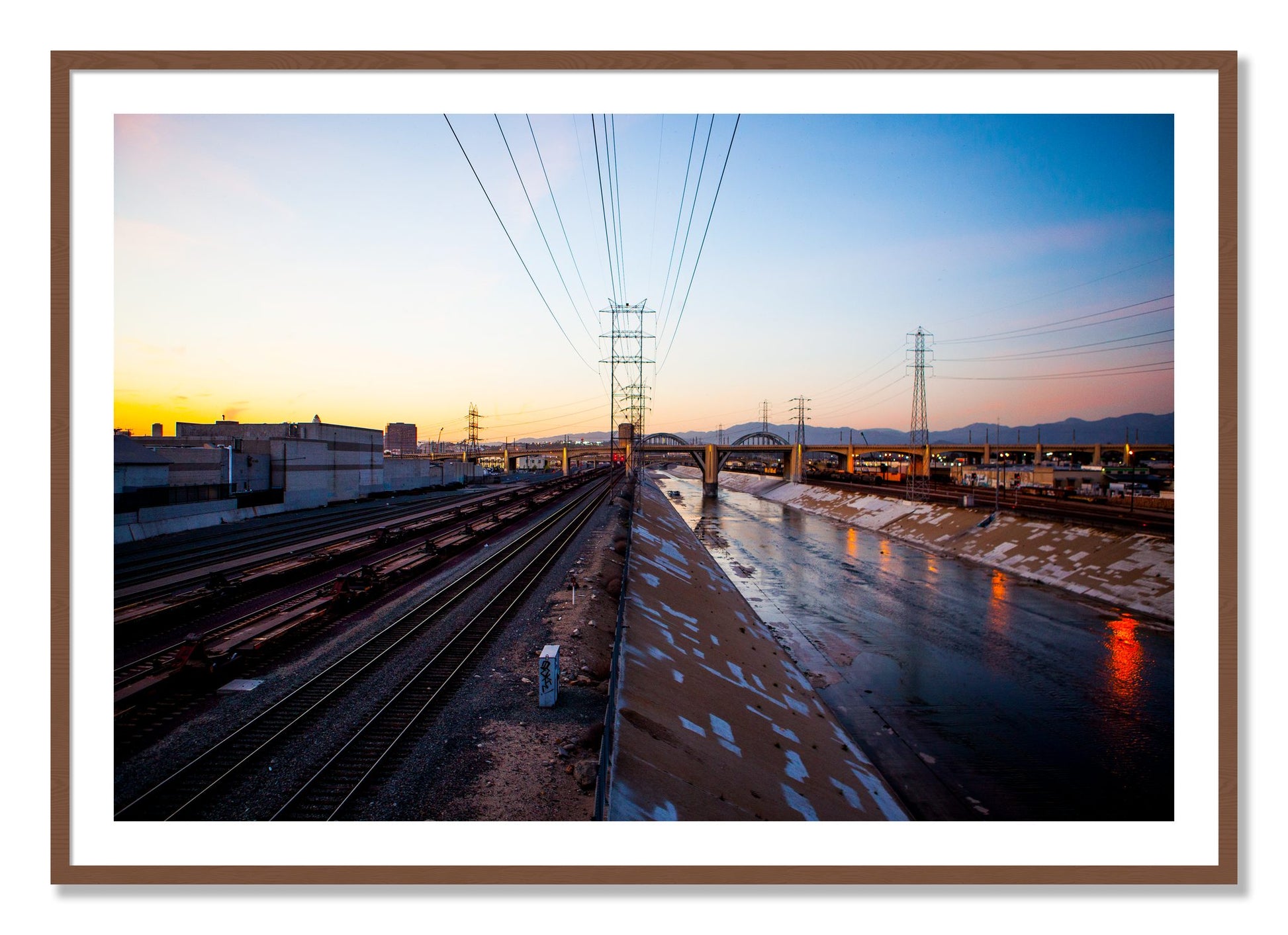 Framed photograph of LARiver by Dylan Ozanich, Walnut frame, Borders