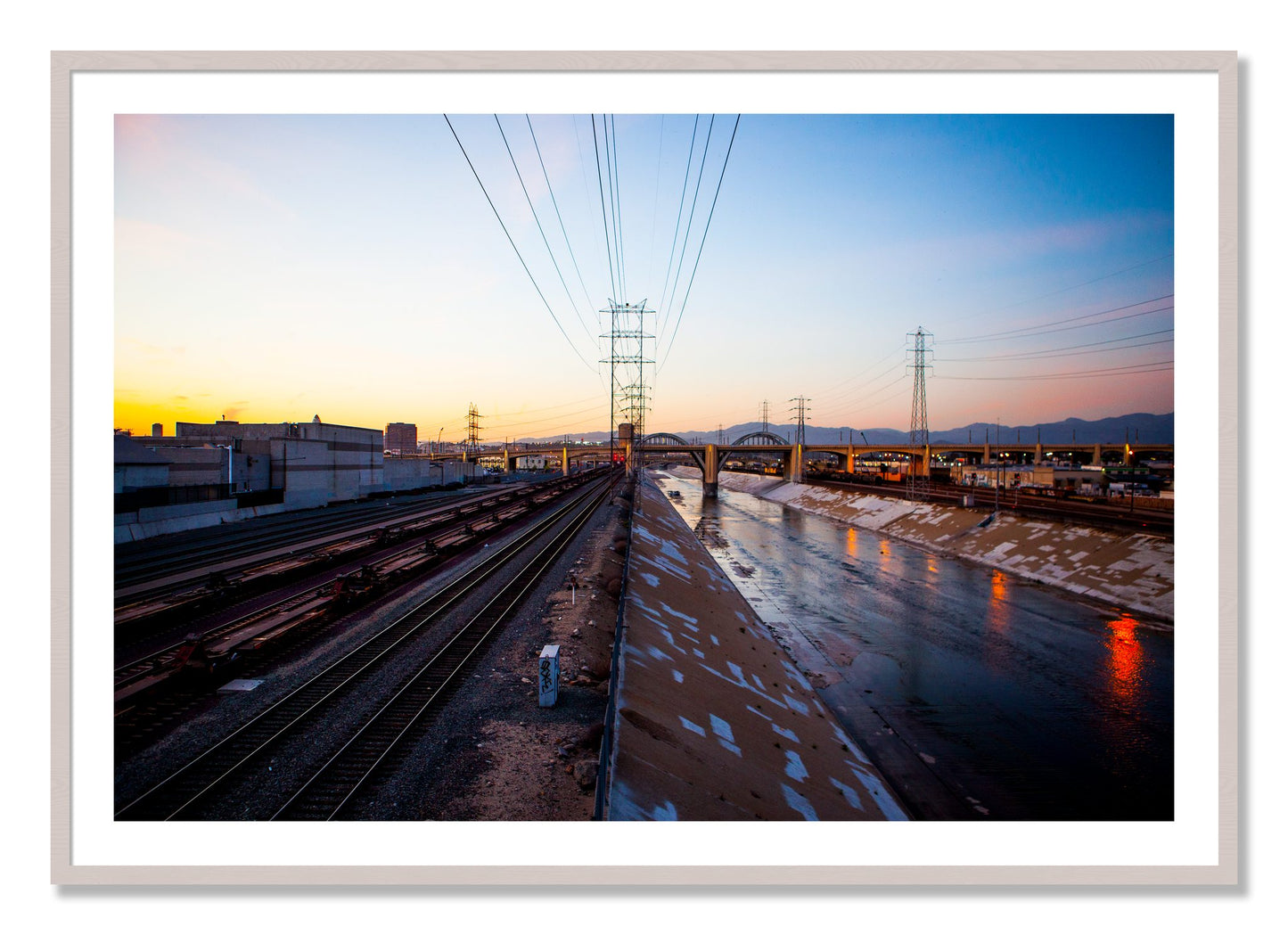 Framed photograph of LARiver by Dylan Ozanich, White Maple frame, Borders