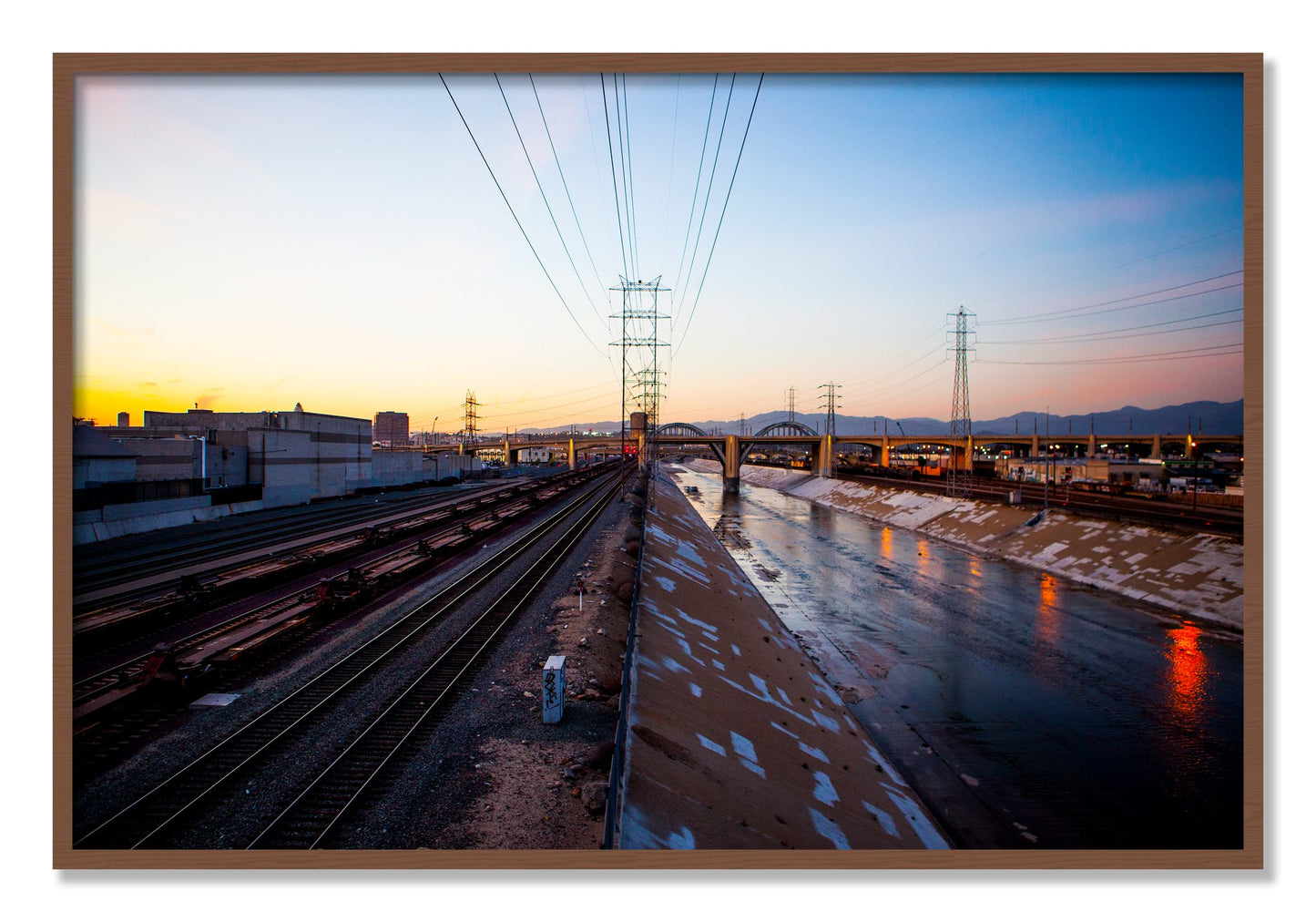 Framed photograph of LARiver by Dylan Ozanich, Walnut frame, Full Bleed