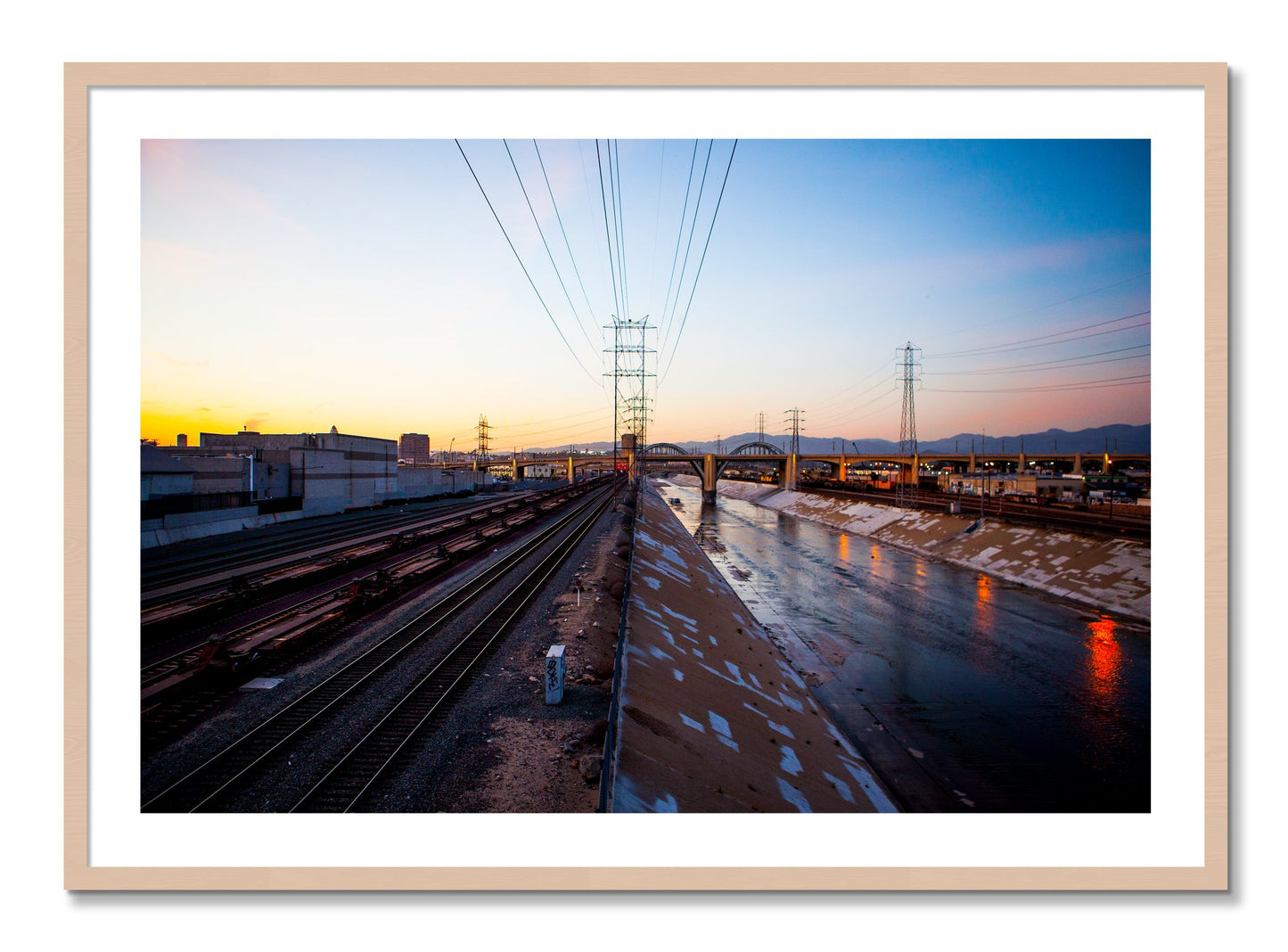 Framed photograph of LARiver by Dylan Ozanich, Maple frame, Borders