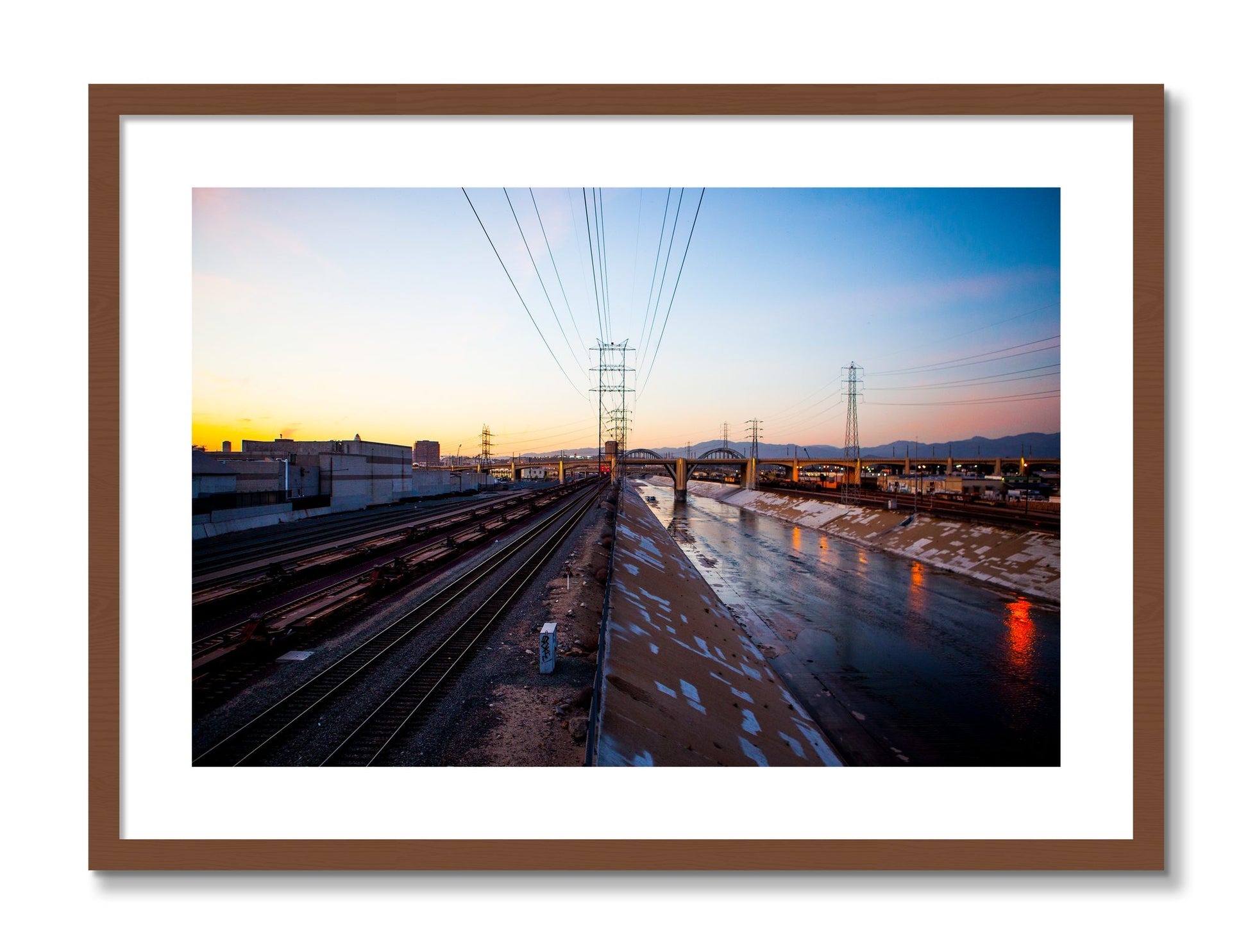 Framed photograph of LARiver by Dylan Ozanich, Walnut frame, Borders