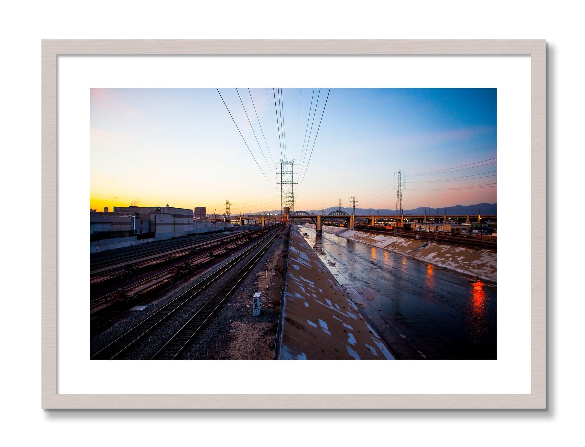 Framed photograph of LARiver by Dylan Ozanich, White Maple frame, Borders