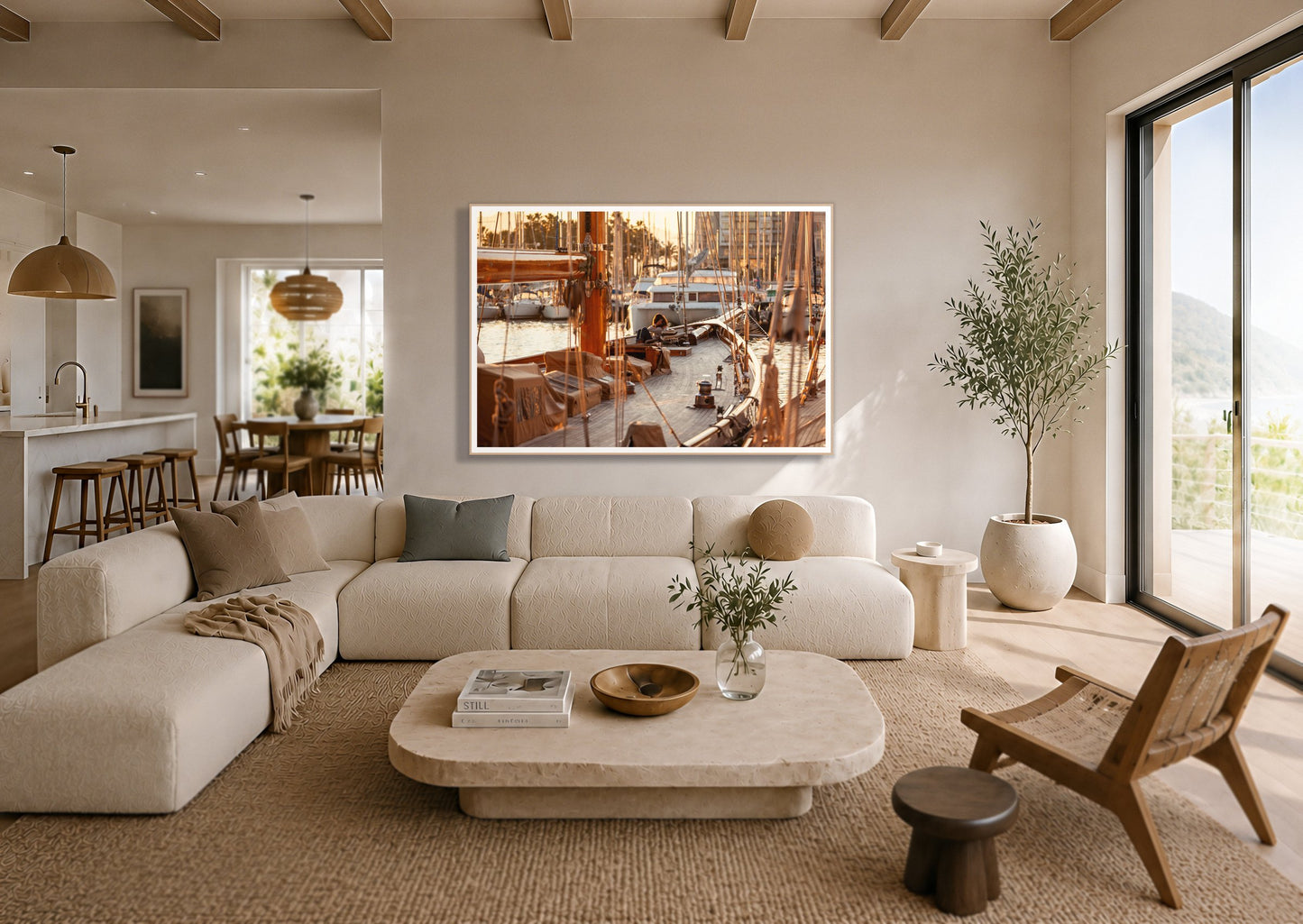 Living by Dylan Ozanich in an Oak frame, above a cream sectional in a coastal living room with an ocean view