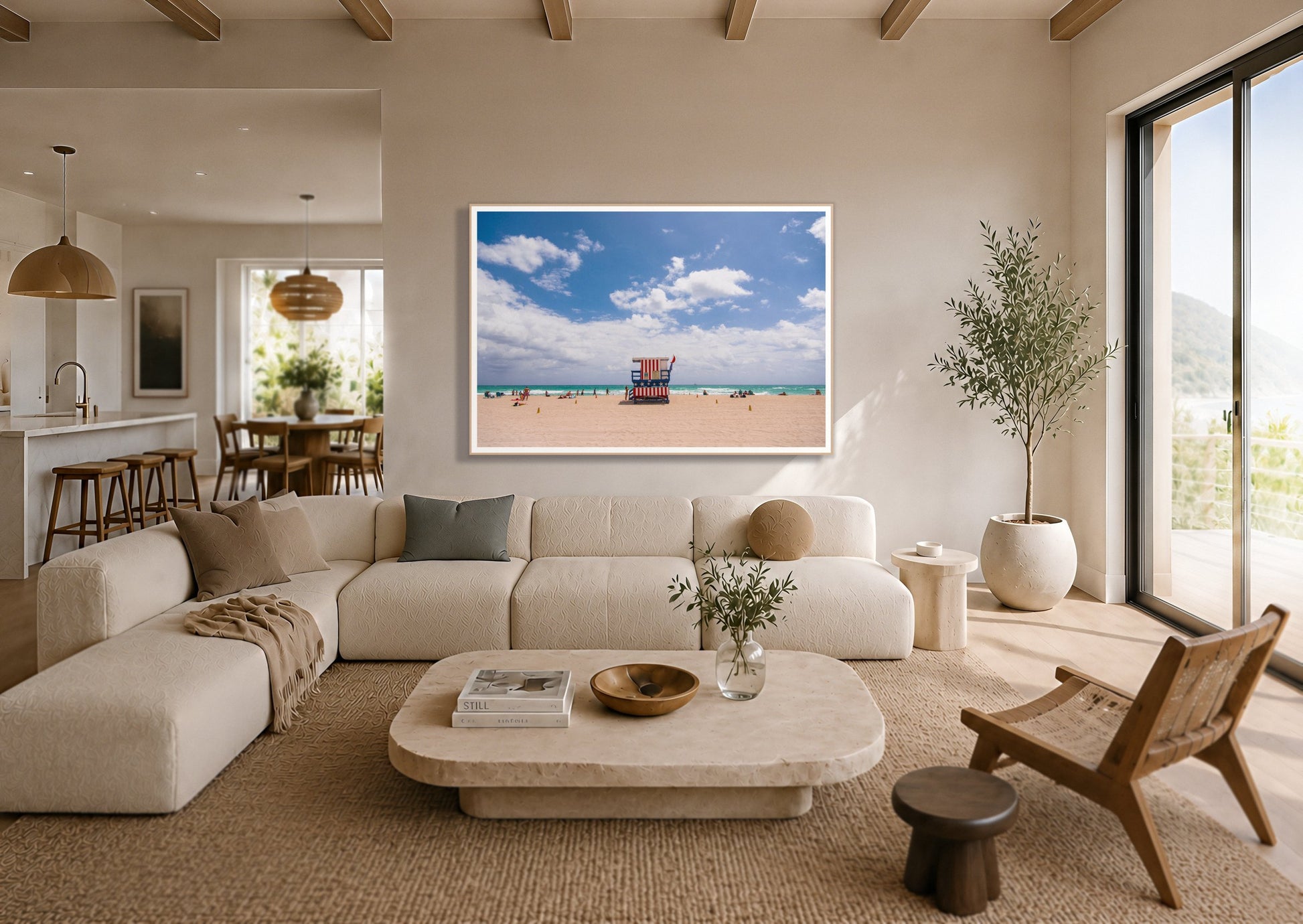 Miami by Dylan Ozanich in an Oak frame, above a cream sectional in a coastal living room with an ocean view