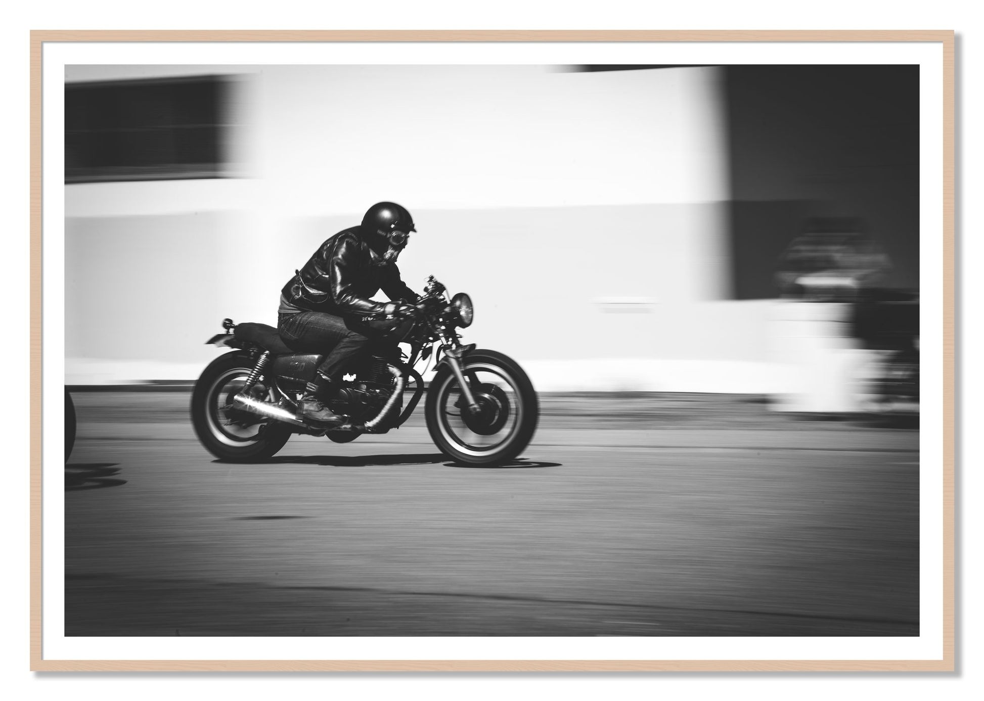 Moto Blurred by Dylan Ozanich, 48×72 print with a White Border in a Maple frame