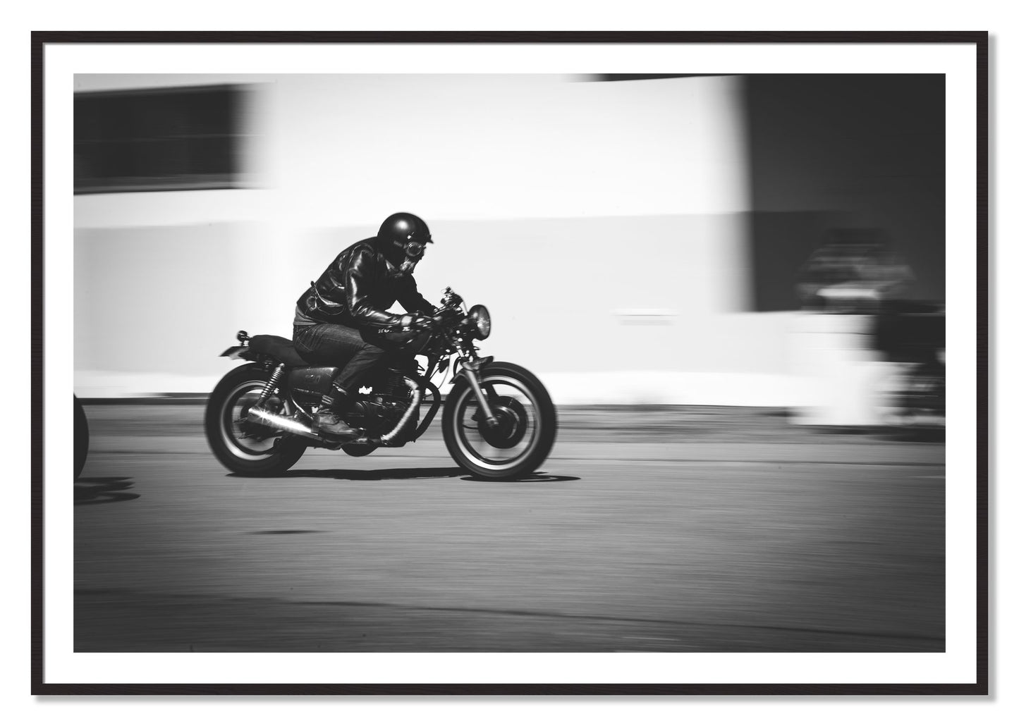 Framed photograph of Moto Blurred by Dylan Ozanich, Black Walnut frame, Borders