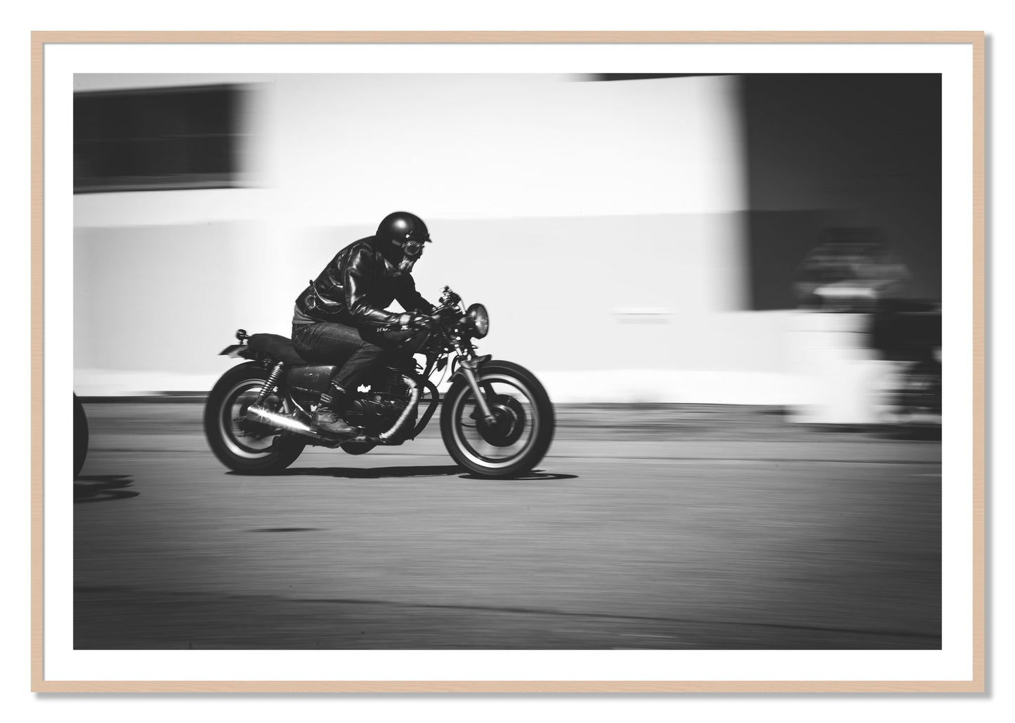 Framed photograph of Moto Blurred by Dylan Ozanich, Maple frame, Borders