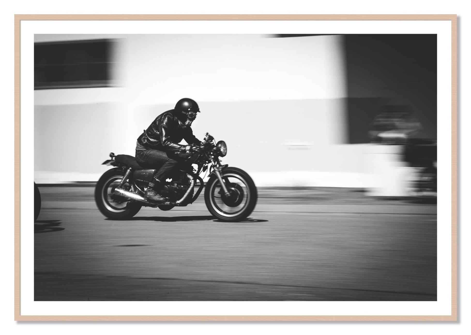 Framed photograph of Moto Blurred by Dylan Ozanich, Maple frame, Borders