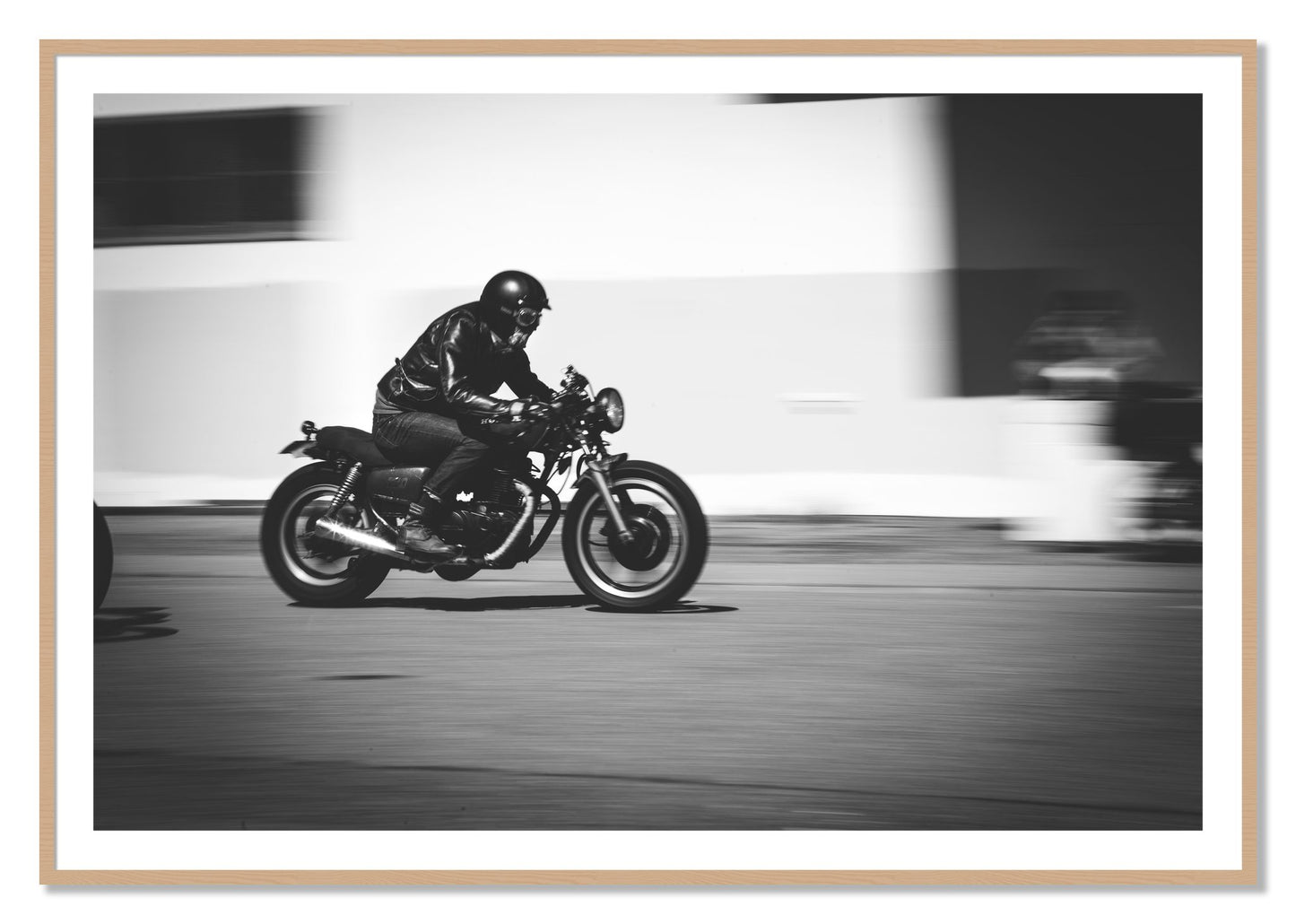 Framed photograph of Moto Blurred by Dylan Ozanich, Oak frame, Borders