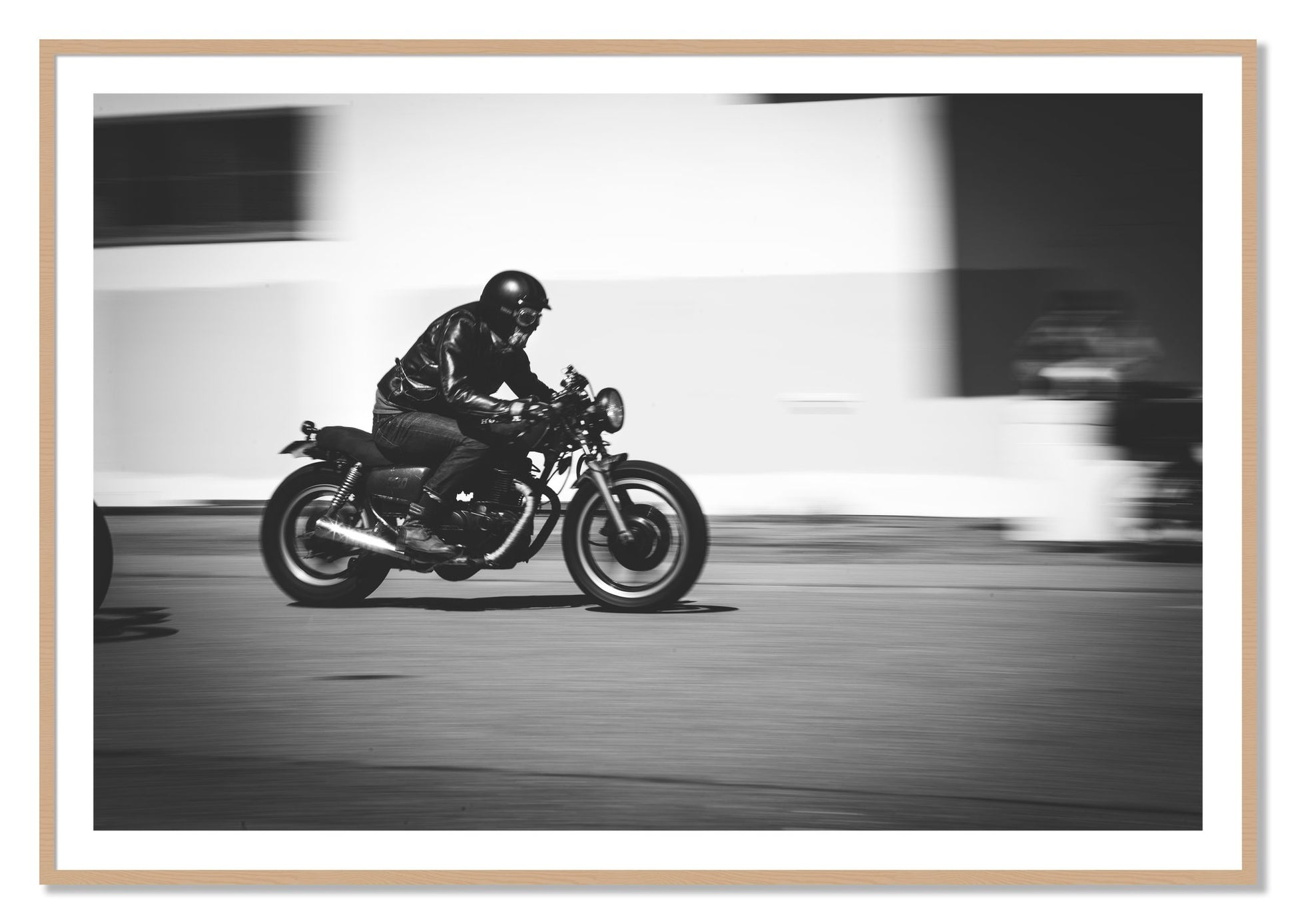 Framed photograph of Moto Blurred by Dylan Ozanich, Oak frame, Borders
