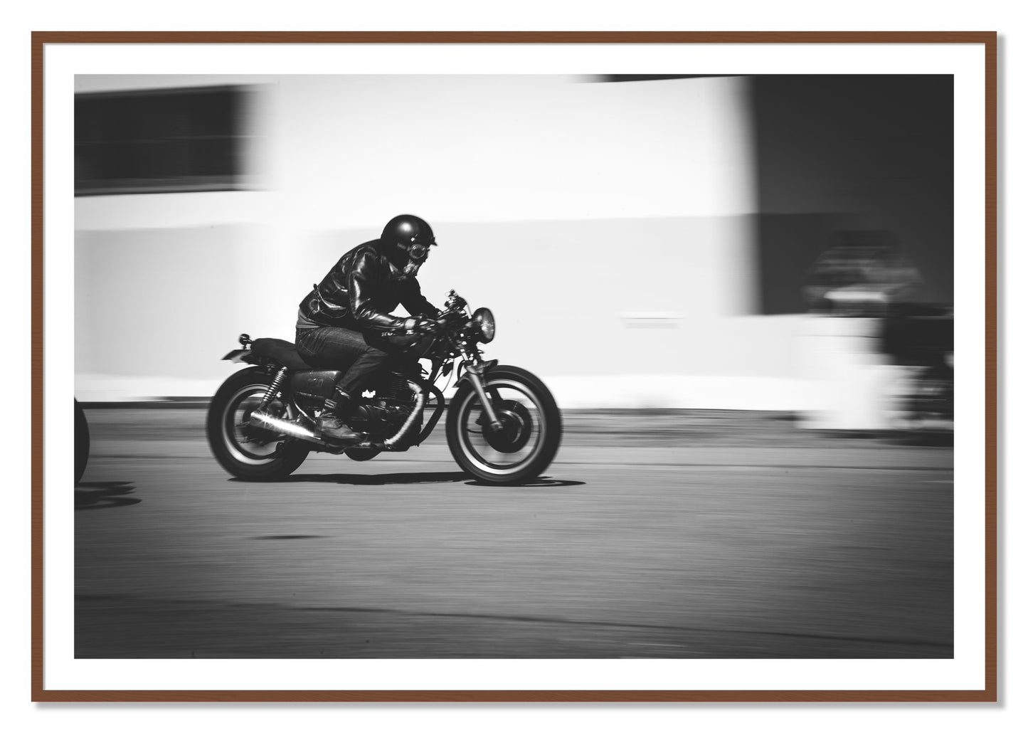 Framed photograph of Moto Blurred by Dylan Ozanich, Walnut frame, Borders