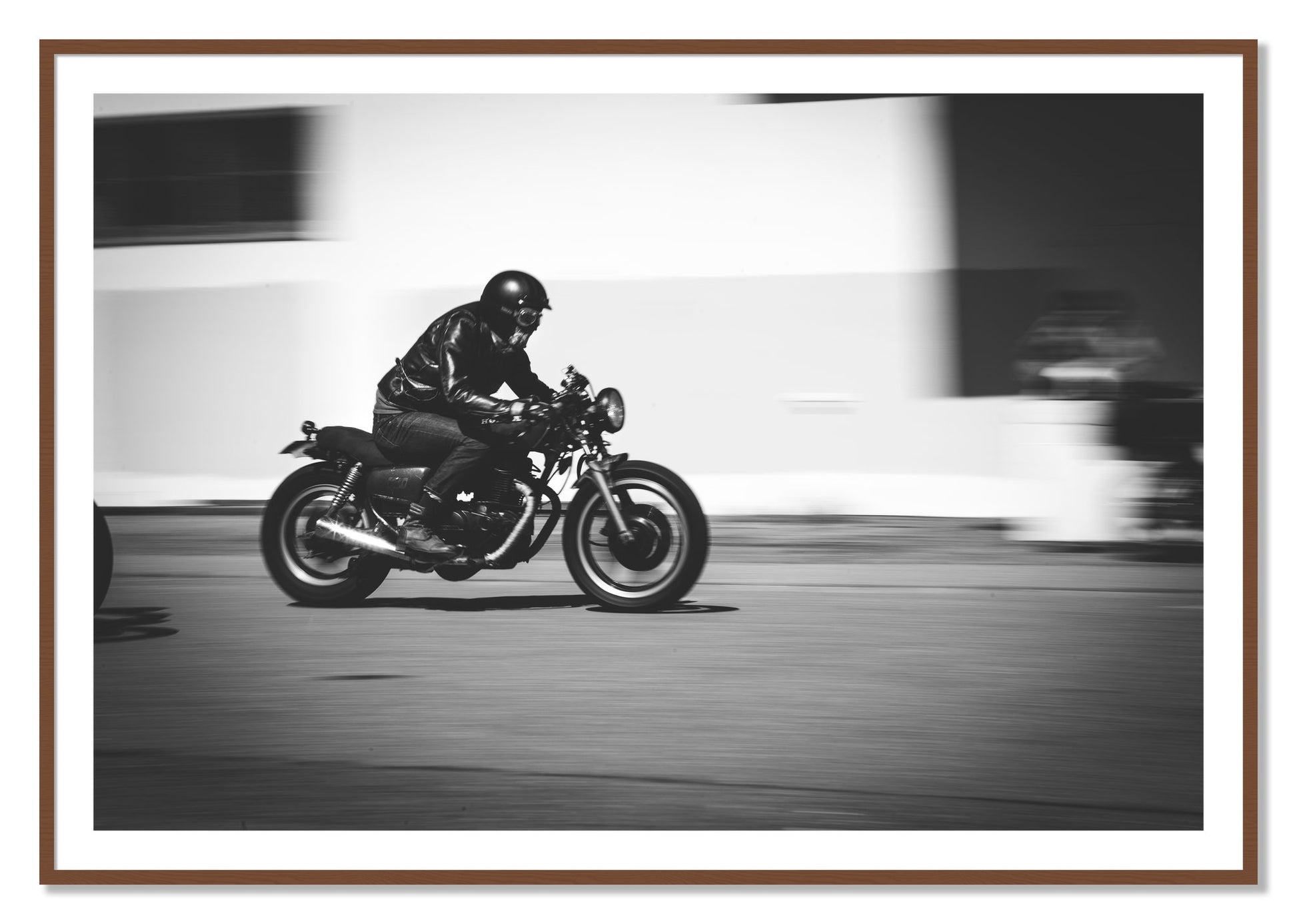 Framed photograph of Moto Blurred by Dylan Ozanich, Walnut frame, Borders