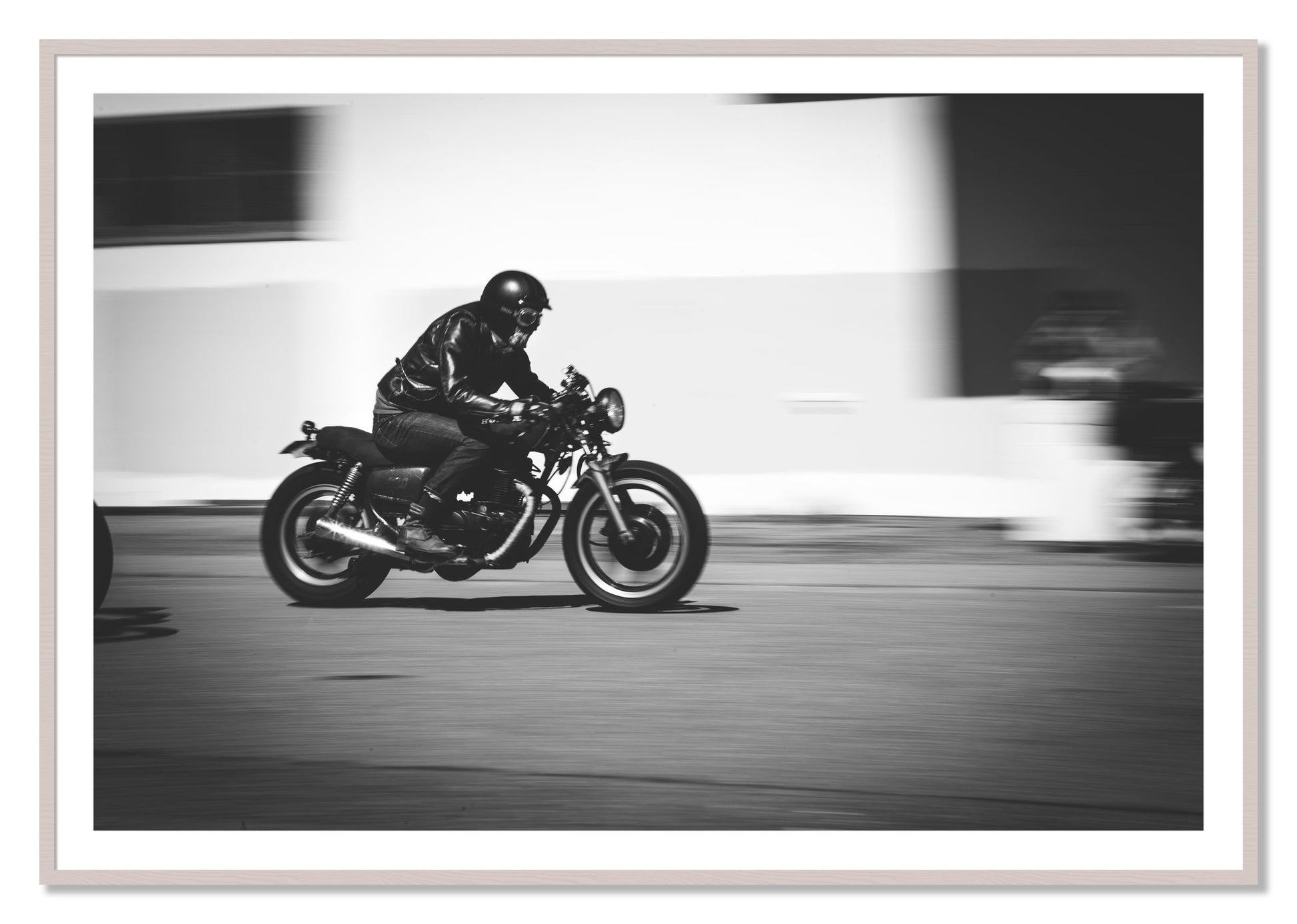 Framed photograph of Moto Blurred by Dylan Ozanich, White Maple frame, Borders