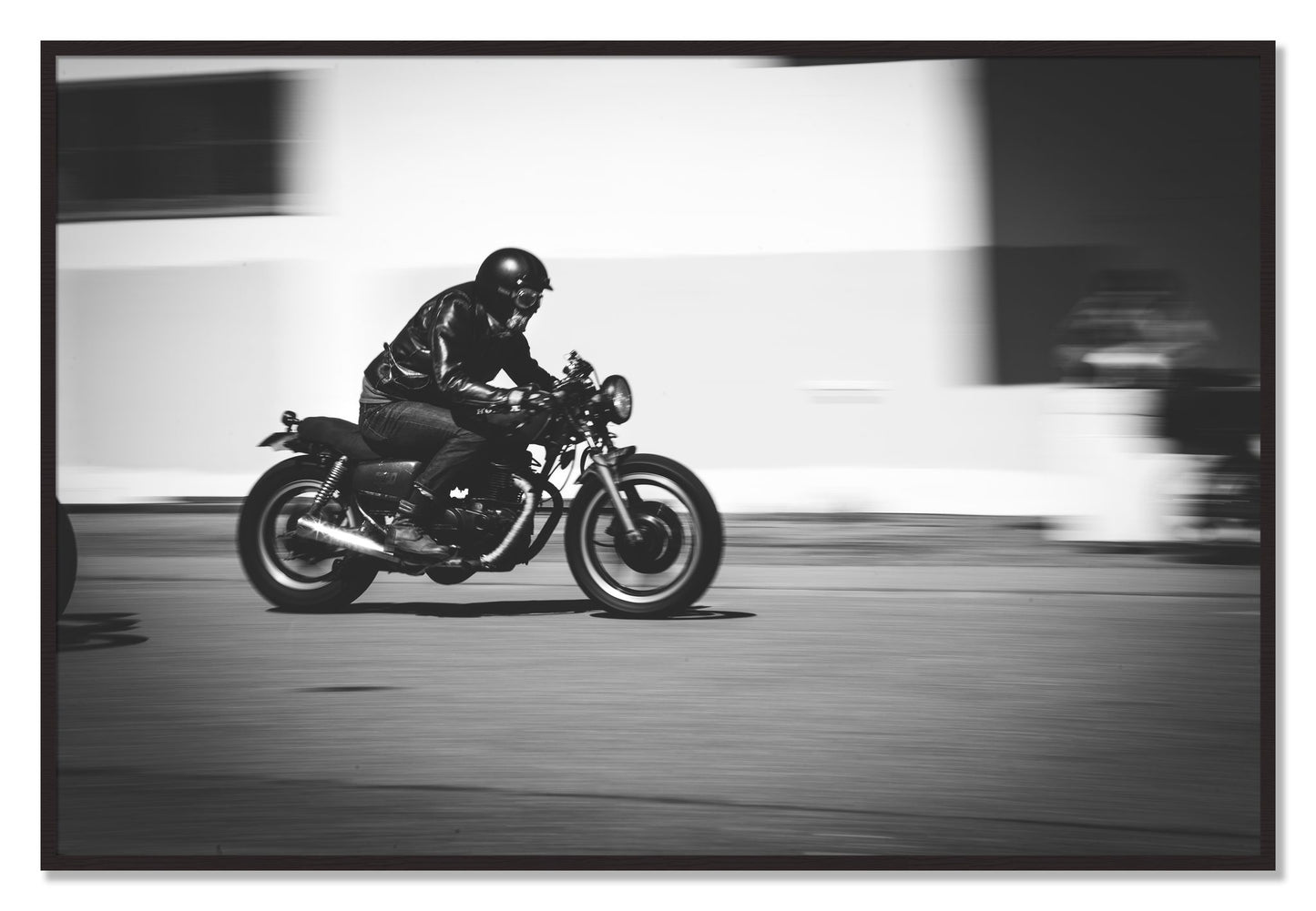 Framed photograph of Moto Blurred by Dylan Ozanich, Black Walnut frame, Full Bleed