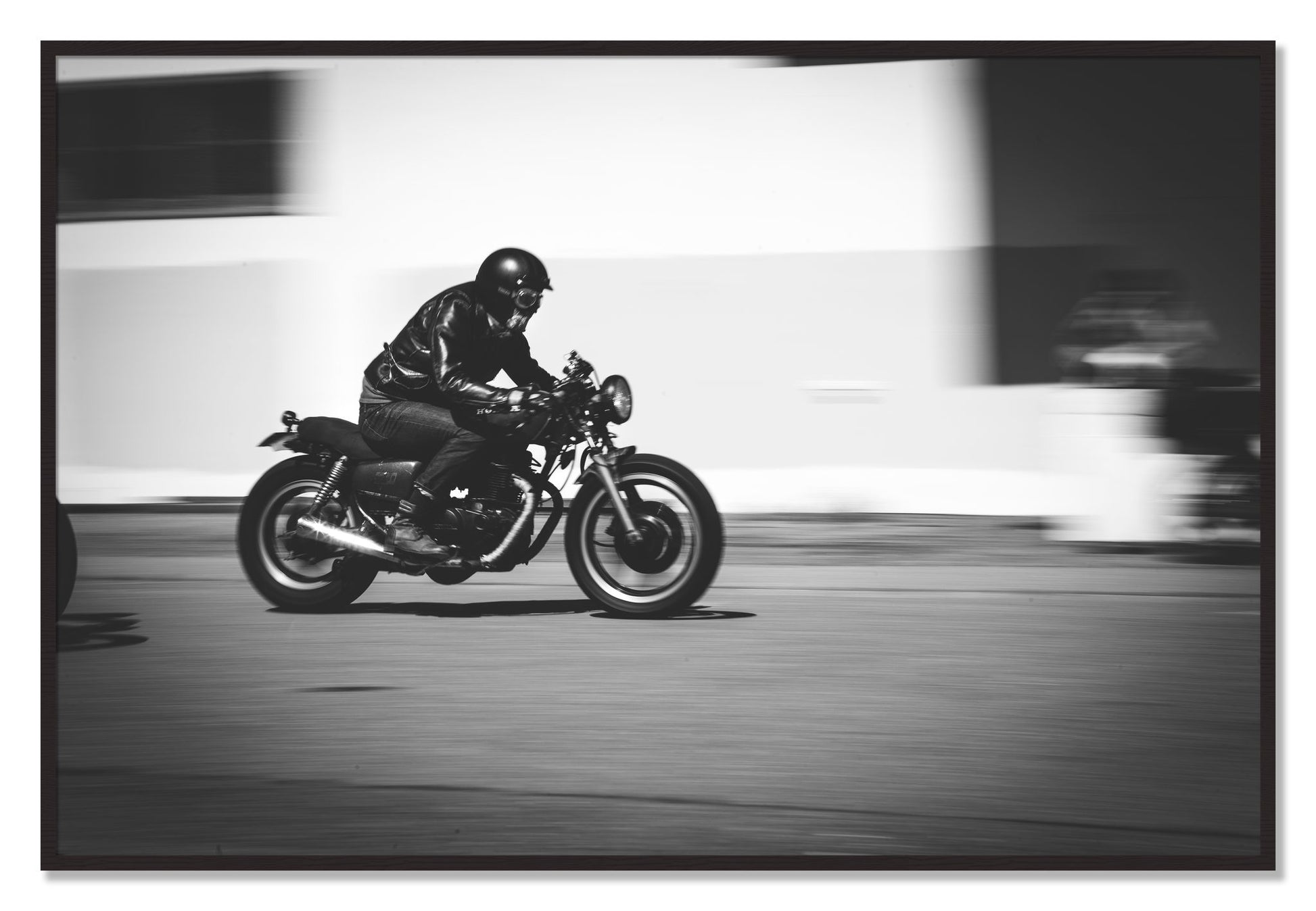 Framed photograph of Moto Blurred by Dylan Ozanich, Black Walnut frame, Full Bleed