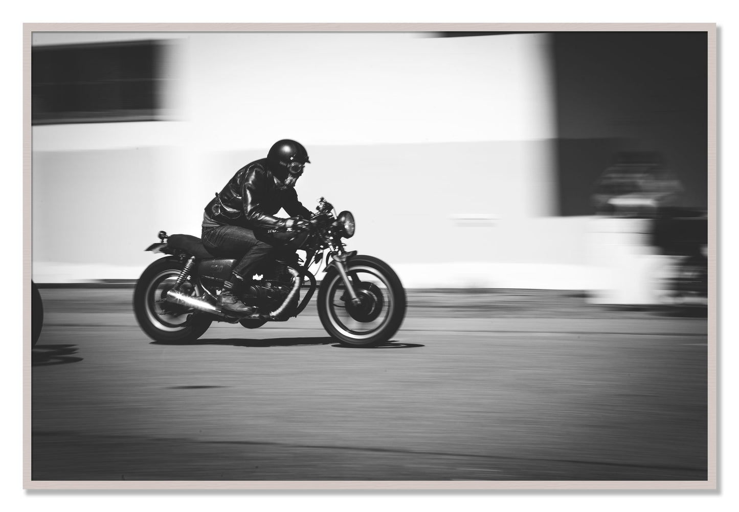 Framed photograph of Moto Blurred by Dylan Ozanich, White Maple frame, Full Bleed