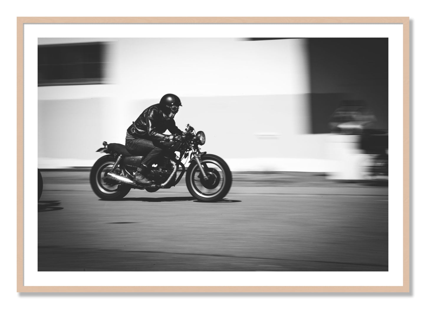 Framed photograph of Moto Blurred by Dylan Ozanich, Maple frame, Borders