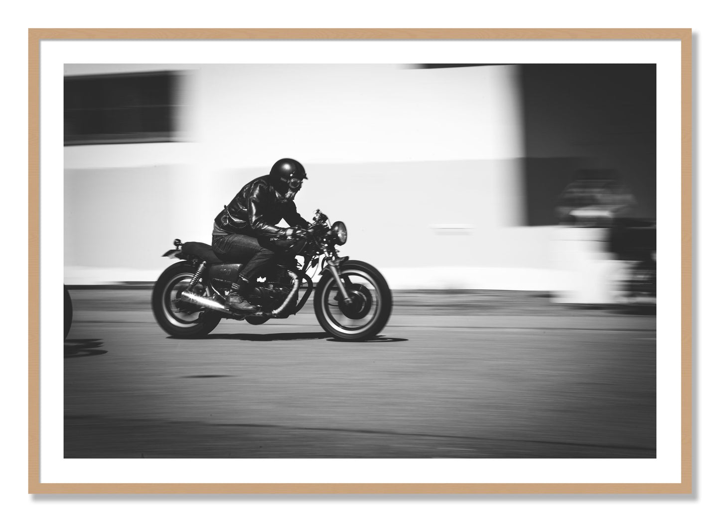 Framed photograph of Moto Blurred by Dylan Ozanich, Oak frame, Borders