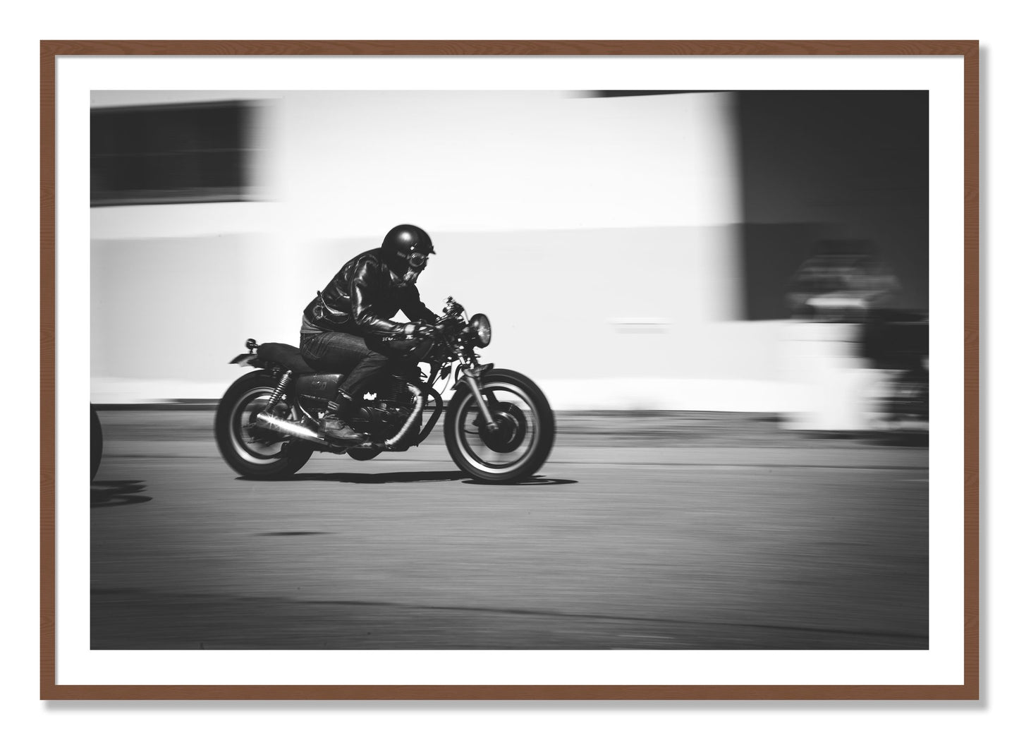 Framed photograph of Moto Blurred by Dylan Ozanich, Walnut frame, Borders