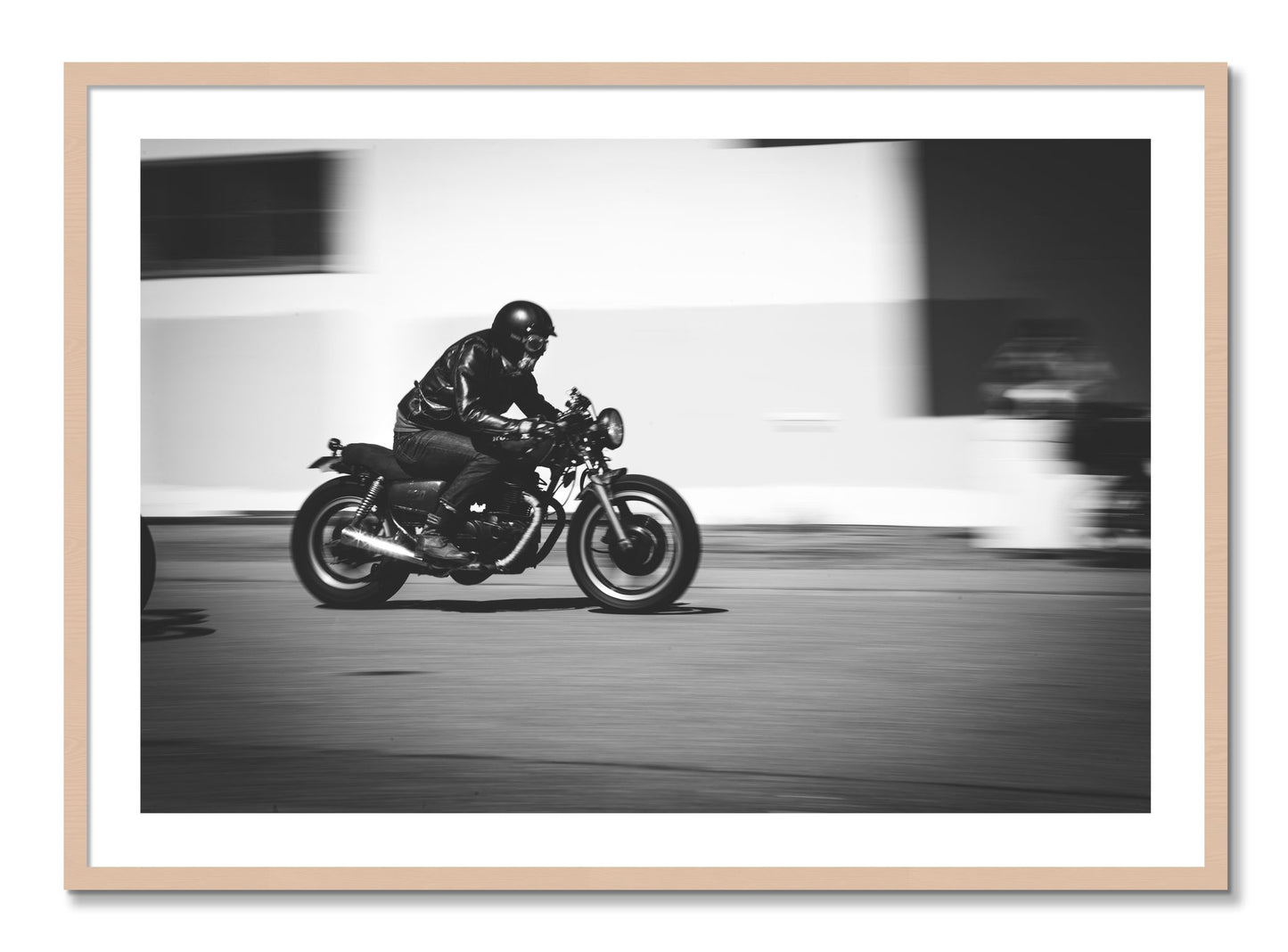 Framed photograph of Moto Blurred by Dylan Ozanich, Maple frame, Borders