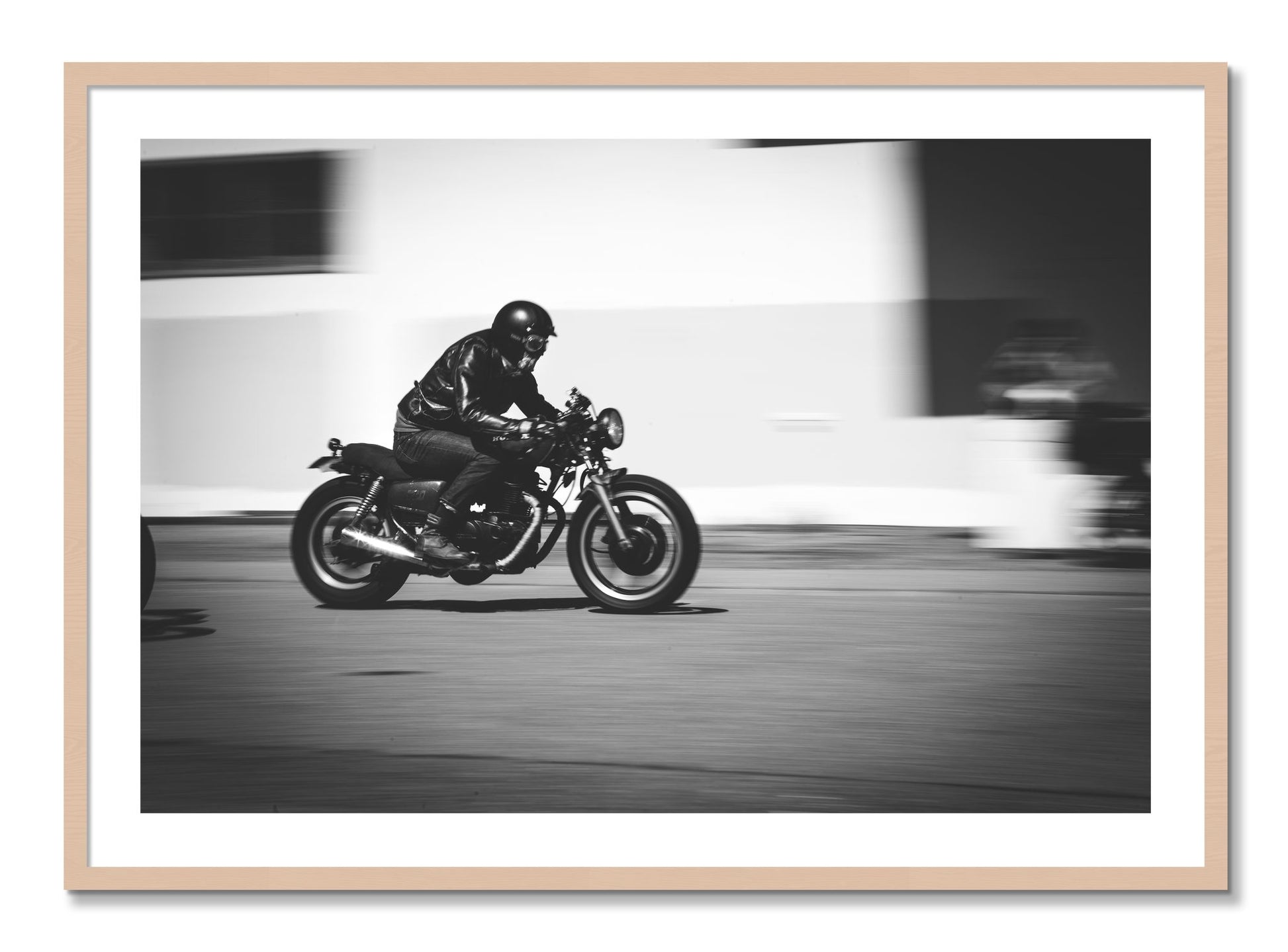 Framed photograph of Moto Blurred by Dylan Ozanich, Maple frame, Borders