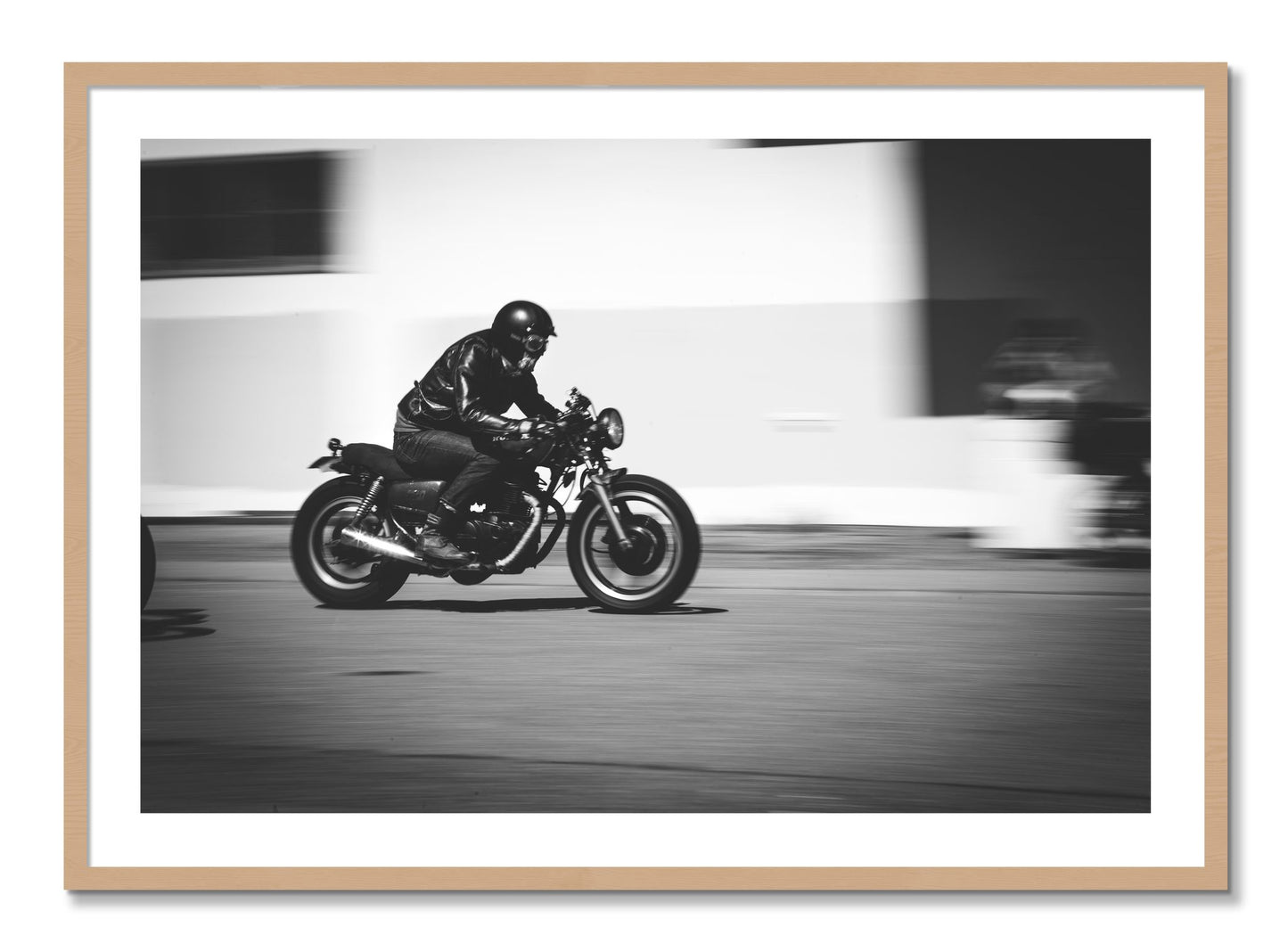 Framed photograph of Moto Blurred by Dylan Ozanich, Oak frame, Borders