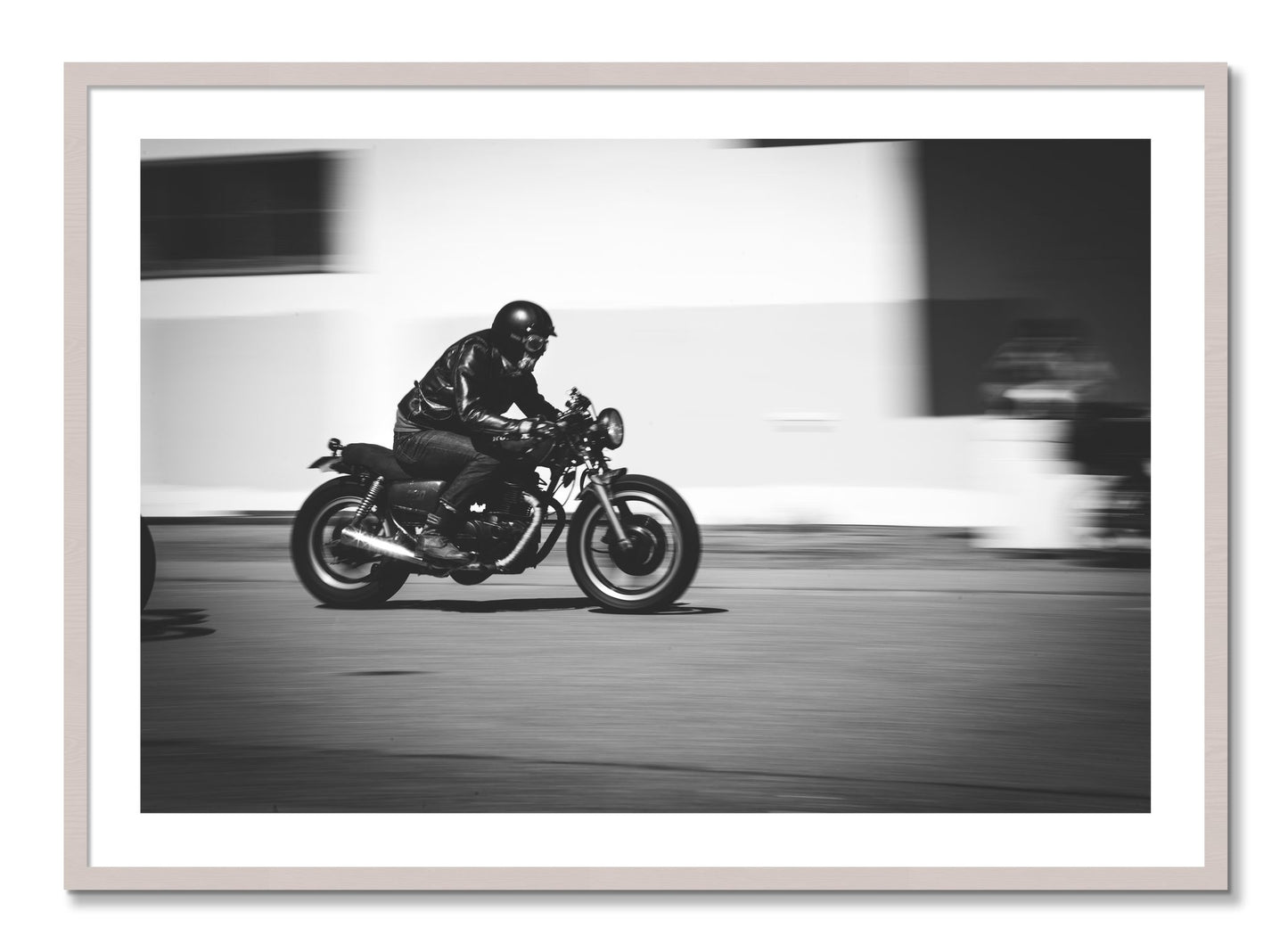 Framed photograph of Moto Blurred by Dylan Ozanich, White Maple frame, Borders